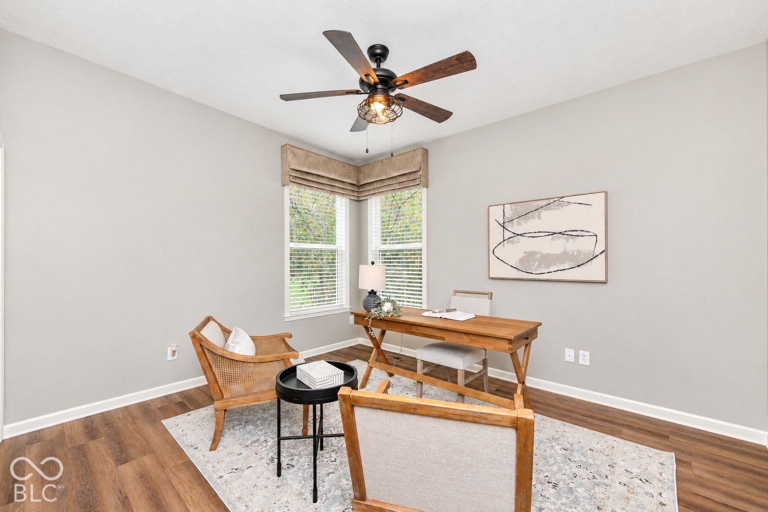 Wood-finish flooring with light gray walls