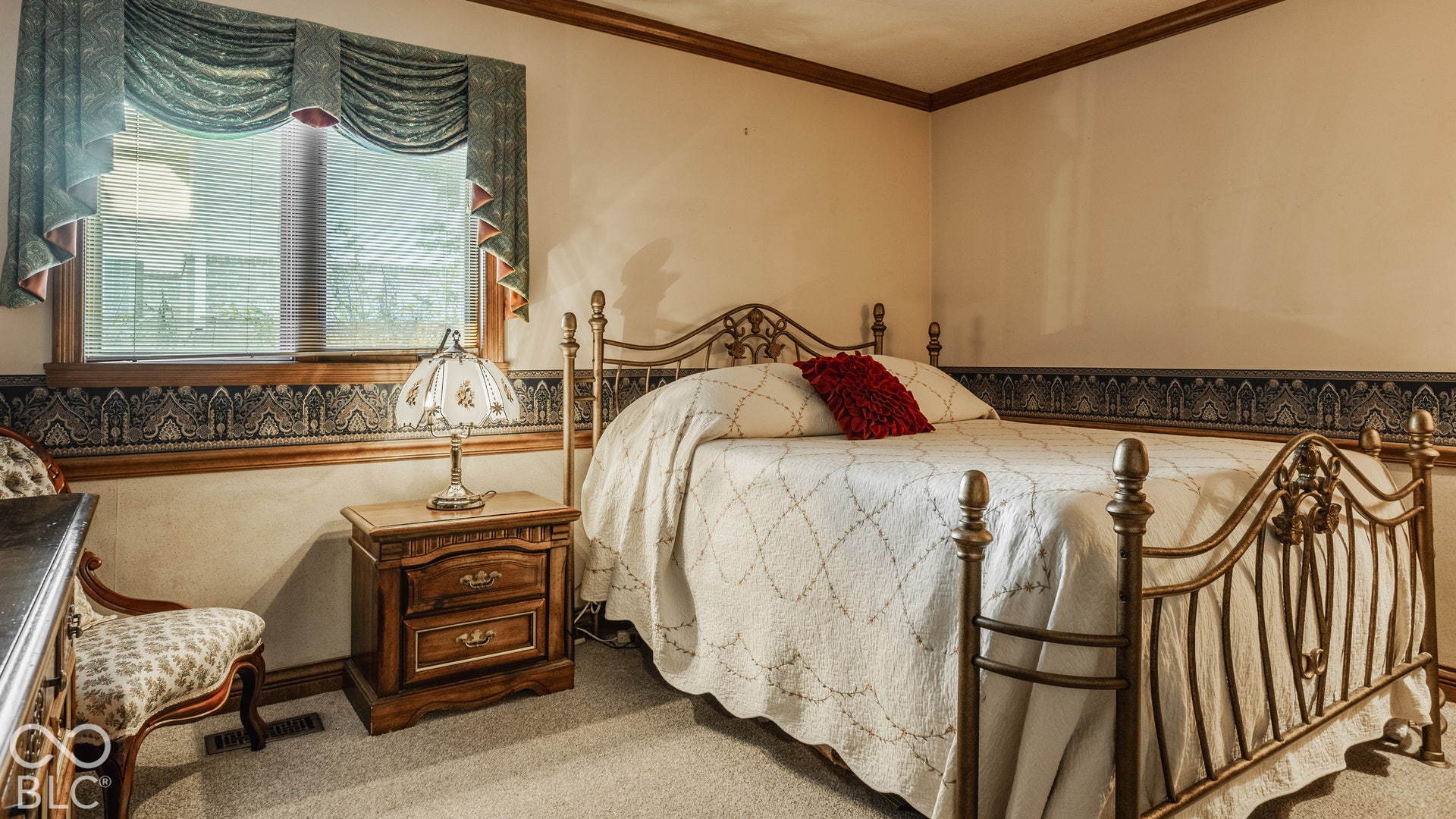 Bedroom 4 in basement apartment with plenty of natural light.