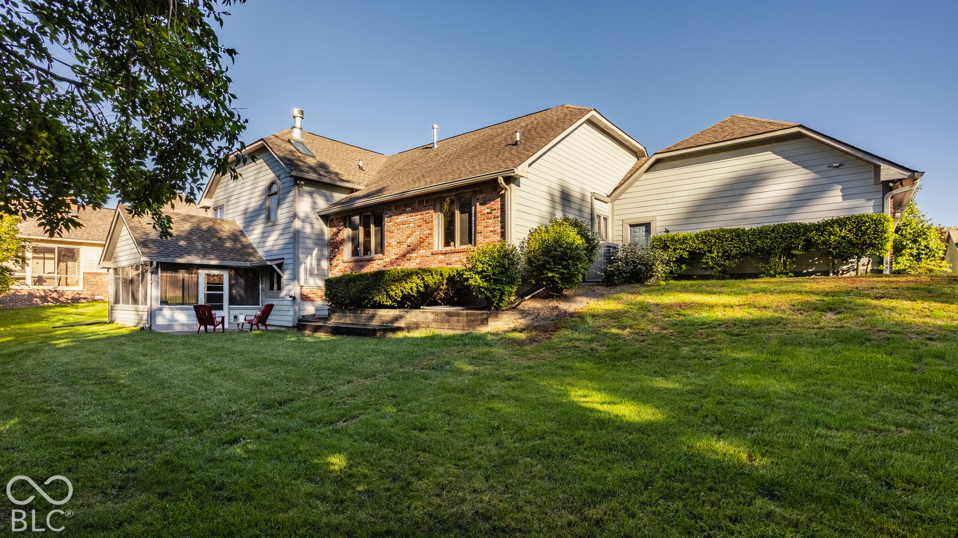 Side load garage and a screened-in porch