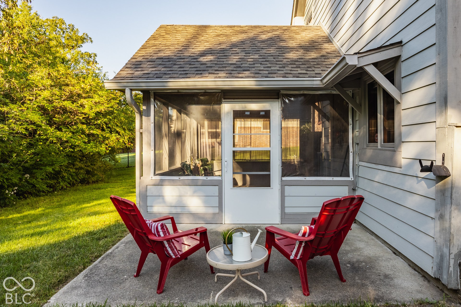 Screened porch from the walk out basement apartment. A french drain was added around the porch.