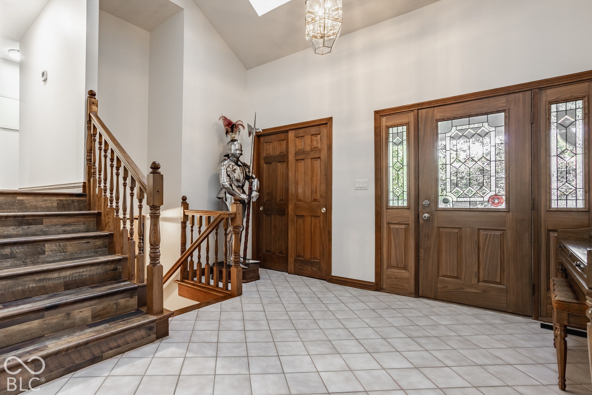 Large entrance foyer leads down to basement apartment or up to 3 other bedrooms.