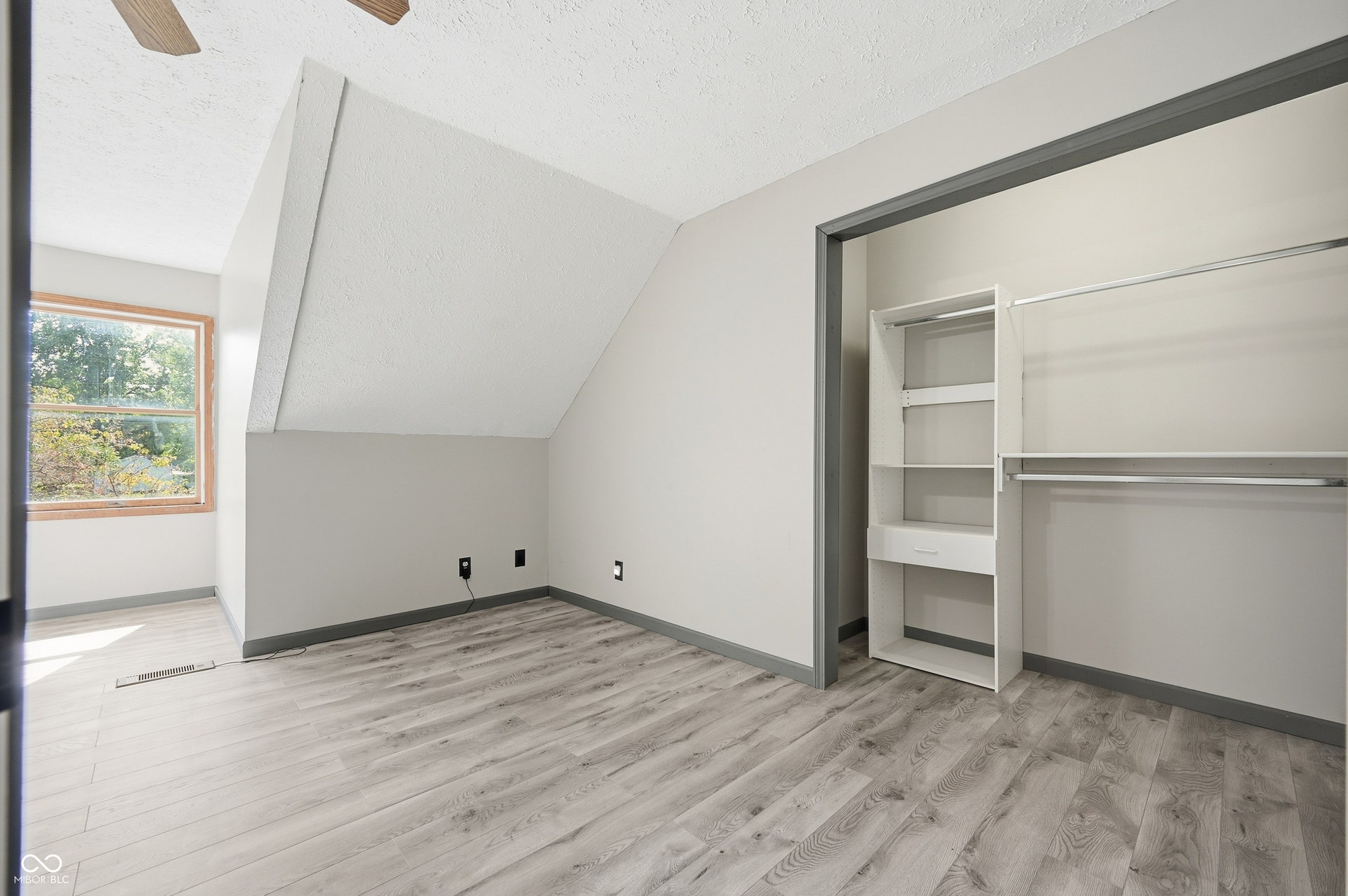 Wood-finish flooring with a neutral paint palette