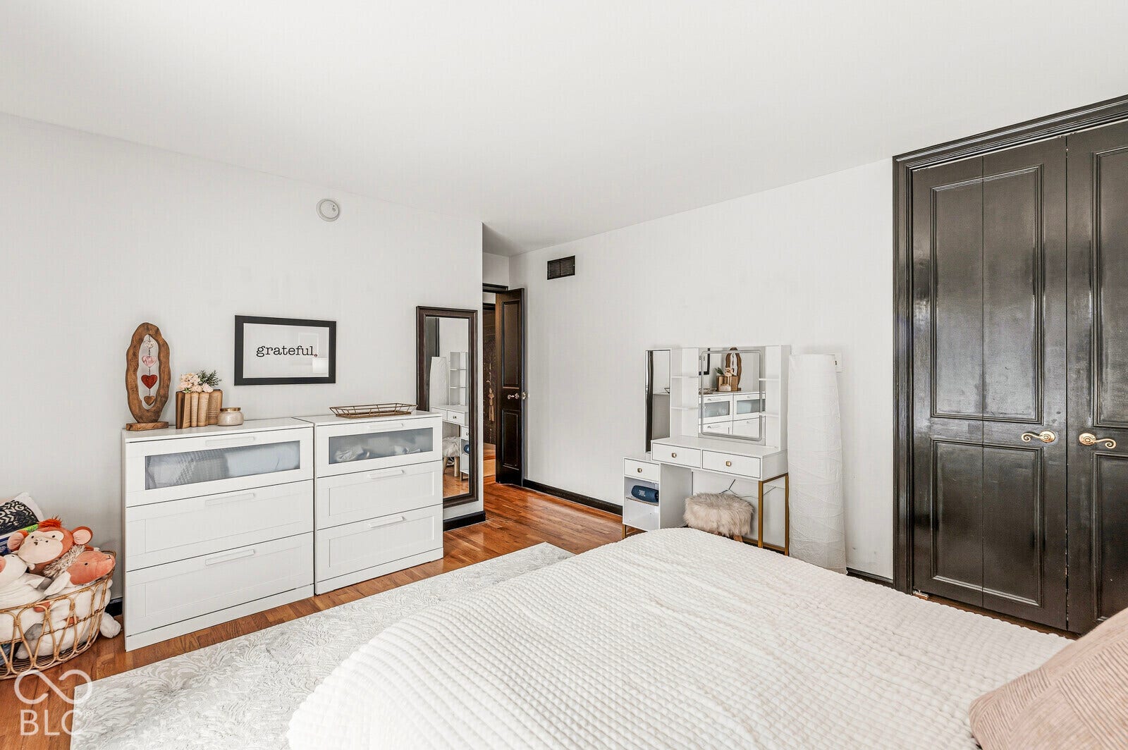 7622 Silverpine Court, Indianapolis, IN 46250 Bedroom 2 has a large glass door to the entry courtyard.