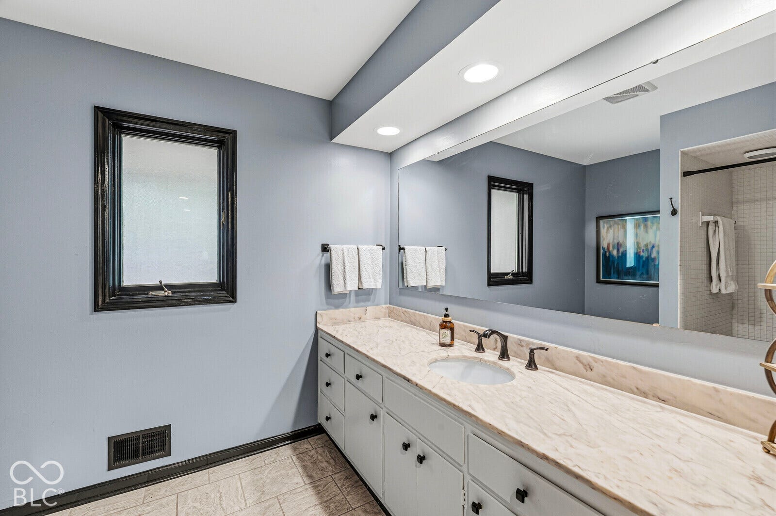 7622 Silverpine Court, Indianapolis, IN 46250 Hallway full bathroom. Original marble countertops with integrated soap dish and a Cinderella tub.