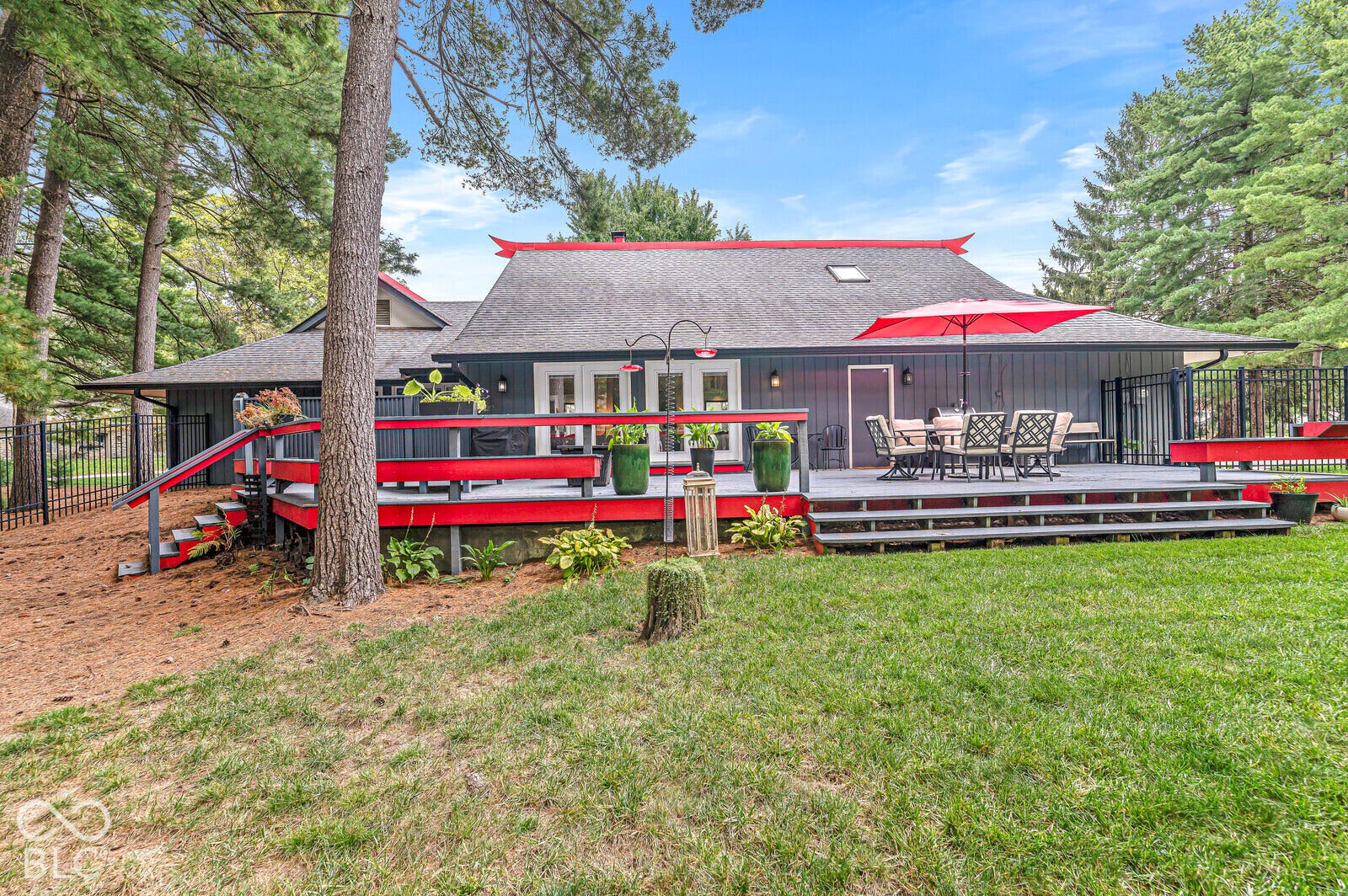 7622 Silverpine Court, Indianapolis, IN 46250 The outdoor living spaces at this home is next to none. A large expands the length of the house, private primary suite courtyard and enclosed entry porch. Backyard is fully fenced.