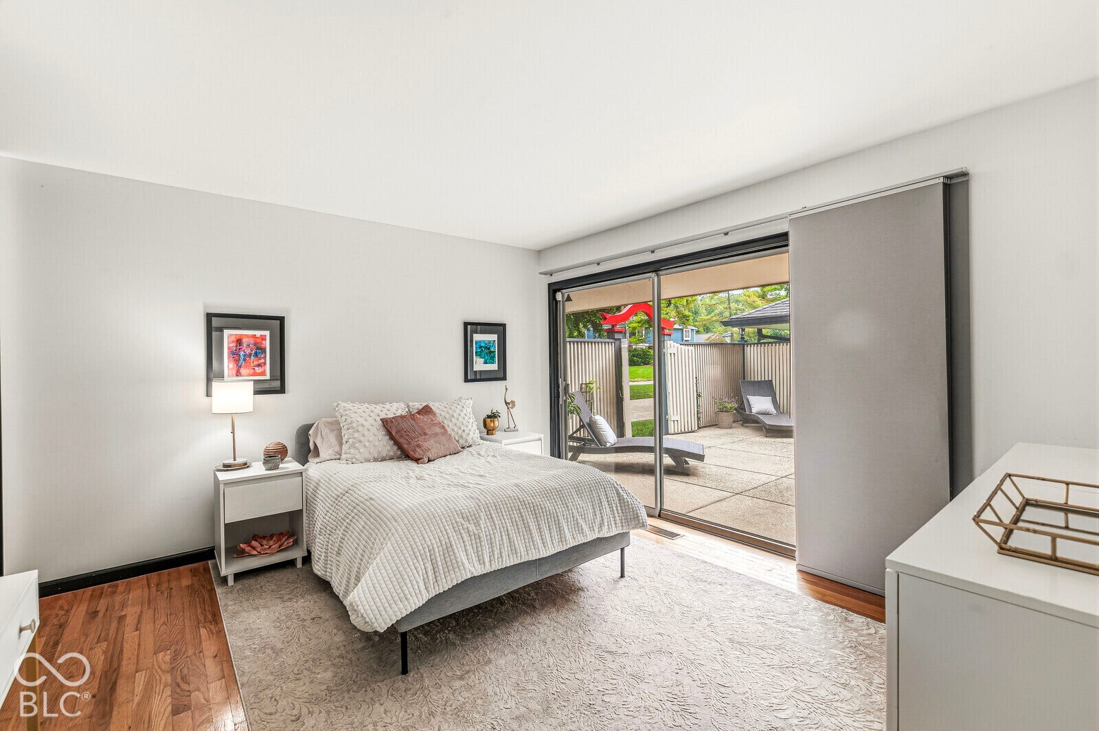 7622 Silverpine Court, Indianapolis, IN 46250 Bedroom 2 has a large glass door to the entry courtyard.