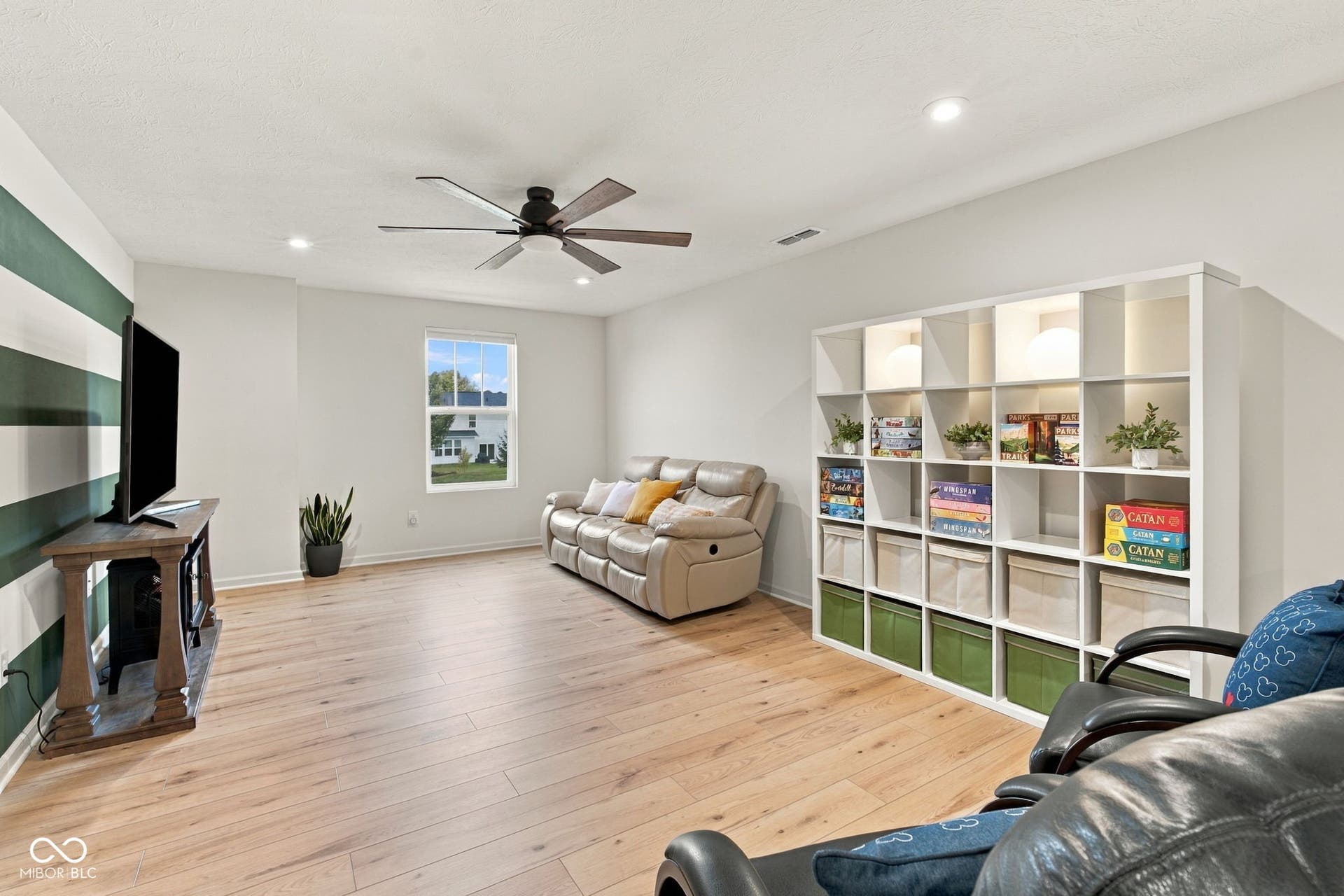 Upper Level Loft with LVP flooring, recessed lighting, and a ceiling fan