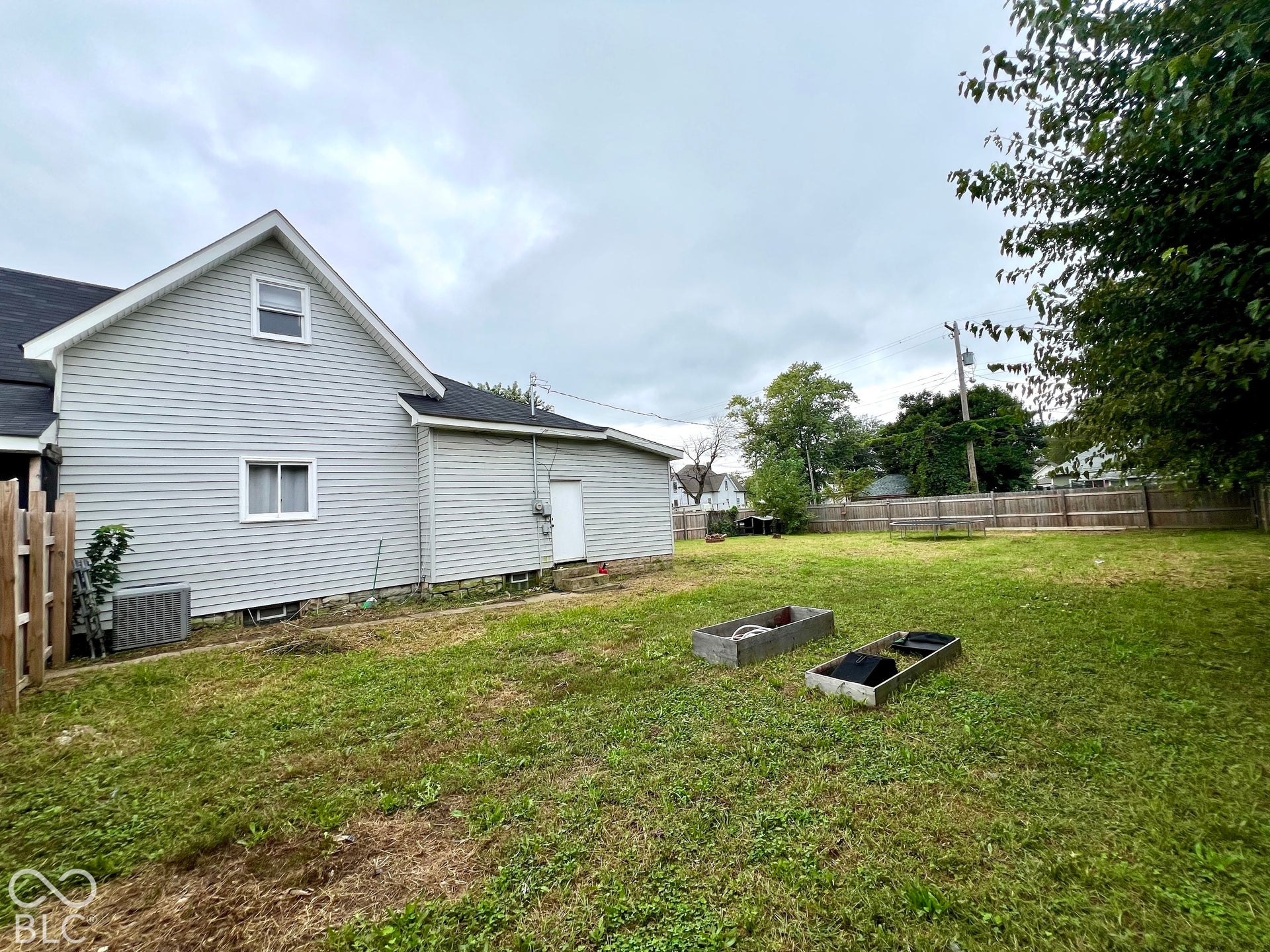 Fully Fenced Backyard with Firepit