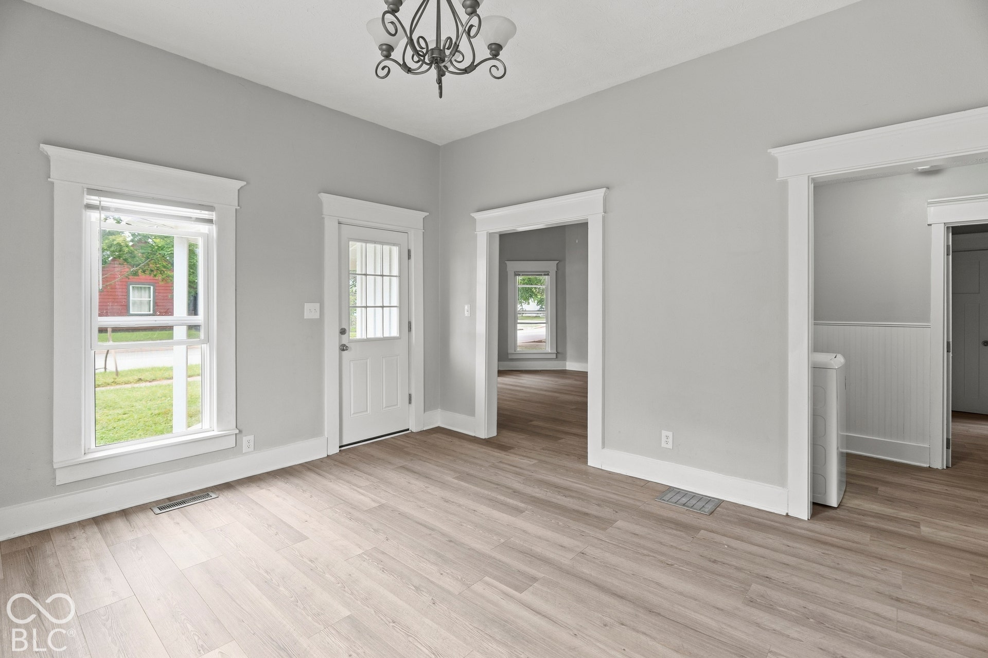 Door leads to front porch and into dining room.