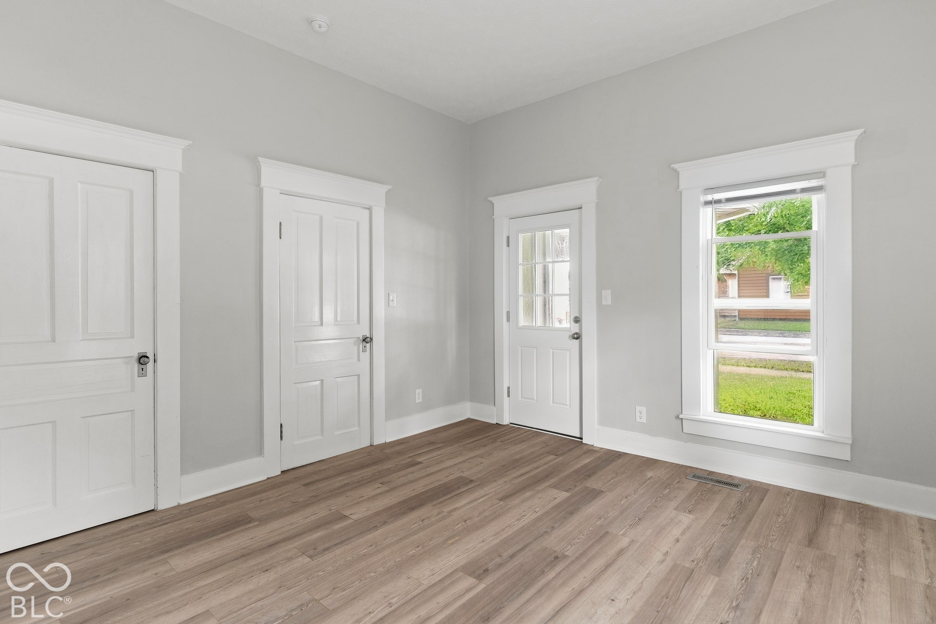 Door leads to front porch.