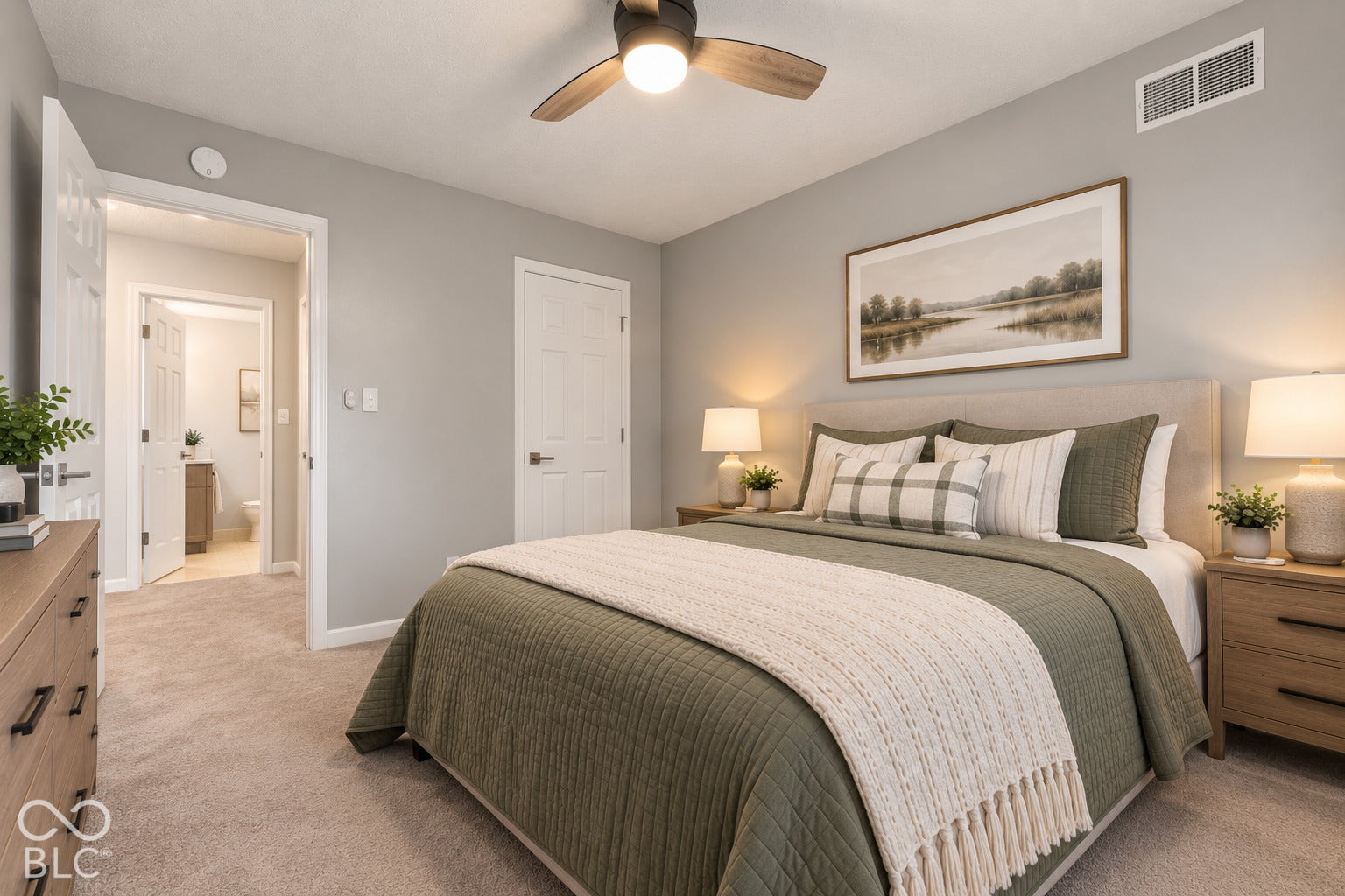 Plush carpet flooring, neutral paint palette, and a ceiling fan with integrated lighting