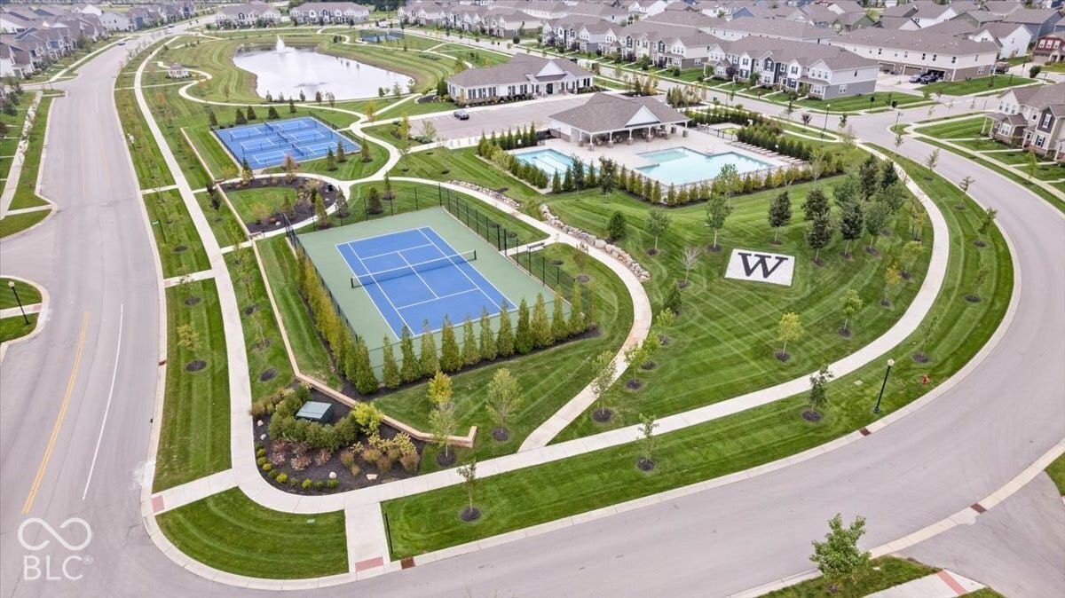 Westgate neighborhood features tennis, pickleball and basketball courts along with two beautiful pools, clubhouse and fitness center.