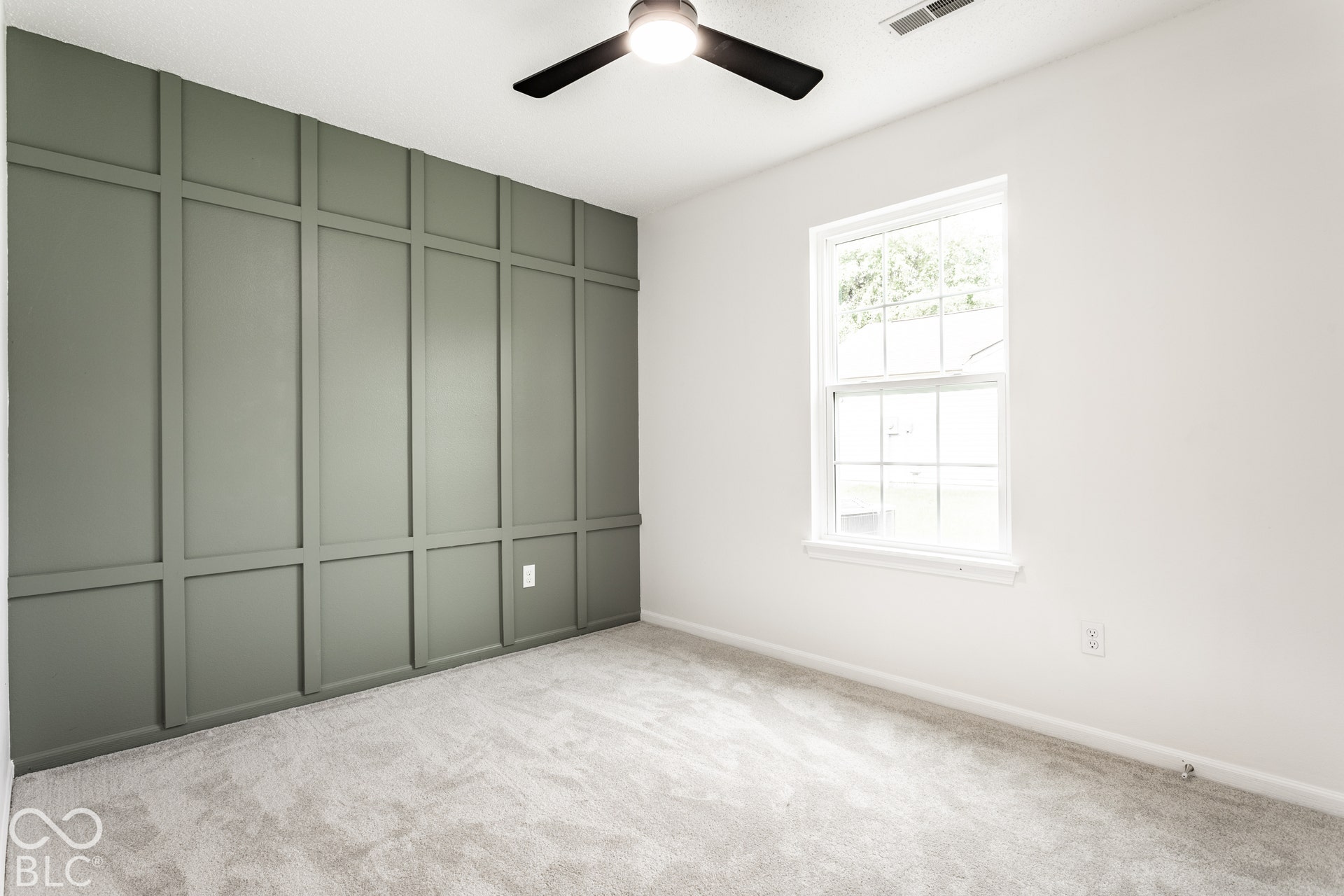 Accent wall with vertical and horizontal paneling