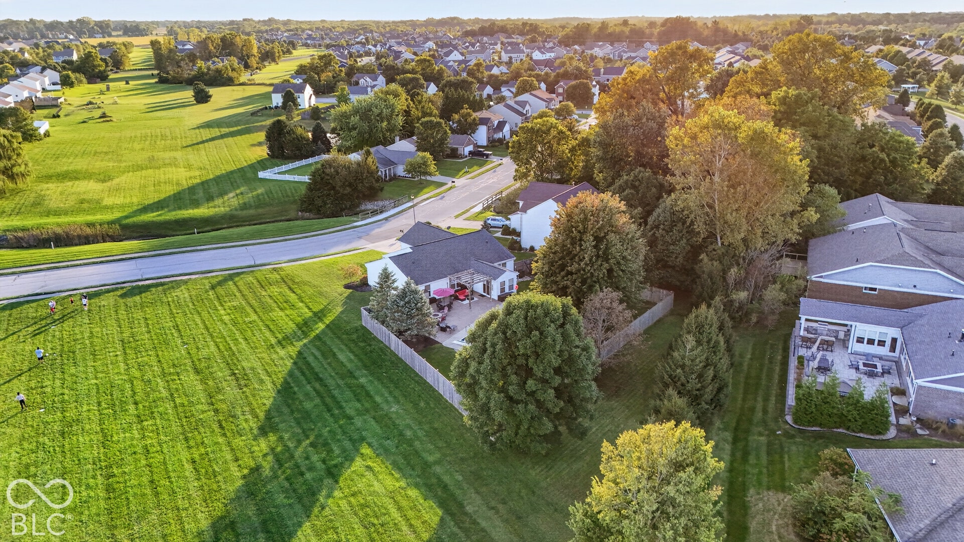 Expansive green space and a suburban neighborhood