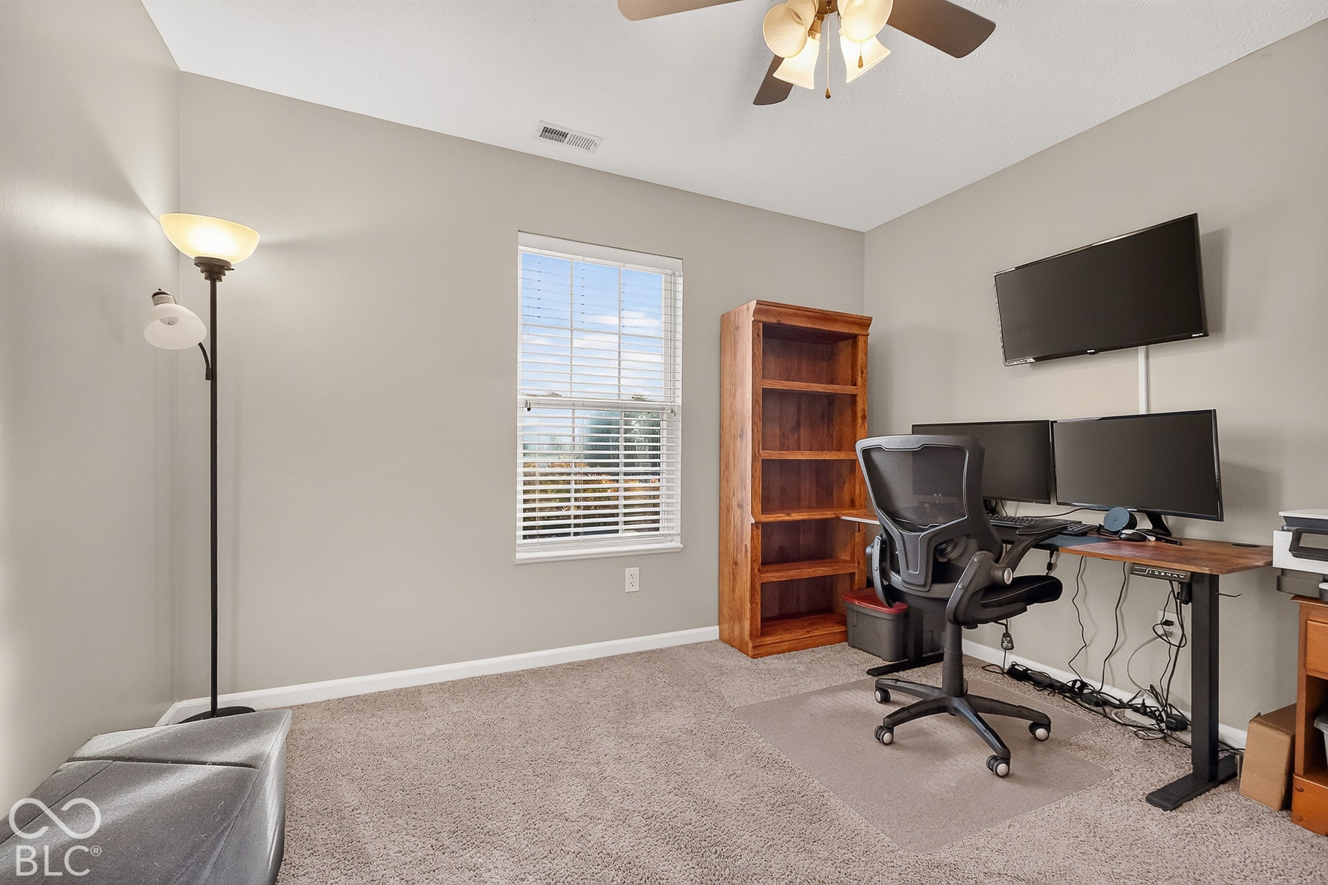 Neutral wall tones complementing carpeted flooring