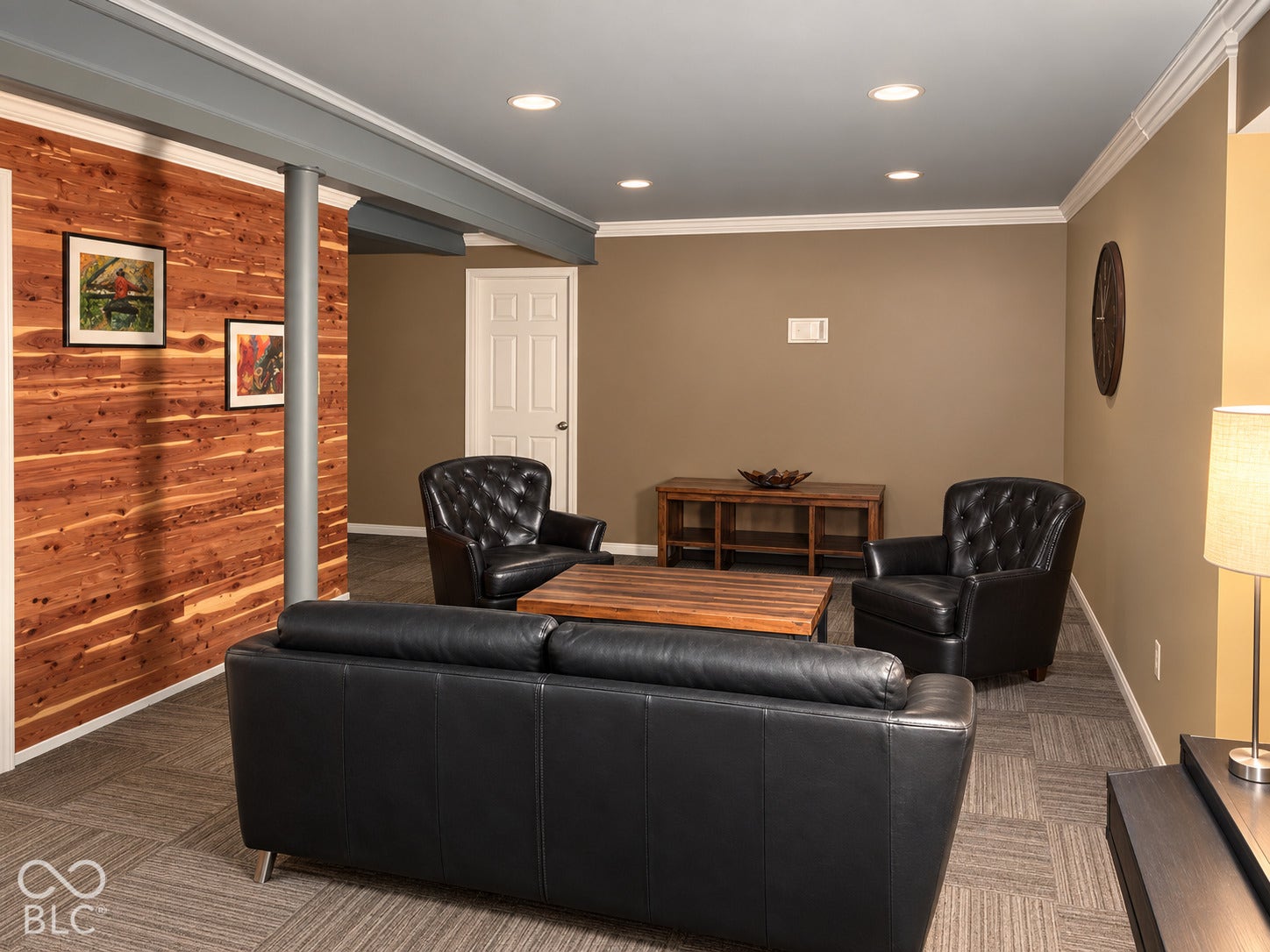 Recessed ceiling lighting, patterned carpet flooring, wood-finish accent wall, crown molding, 5th bedroom on the other side of paneled interior door