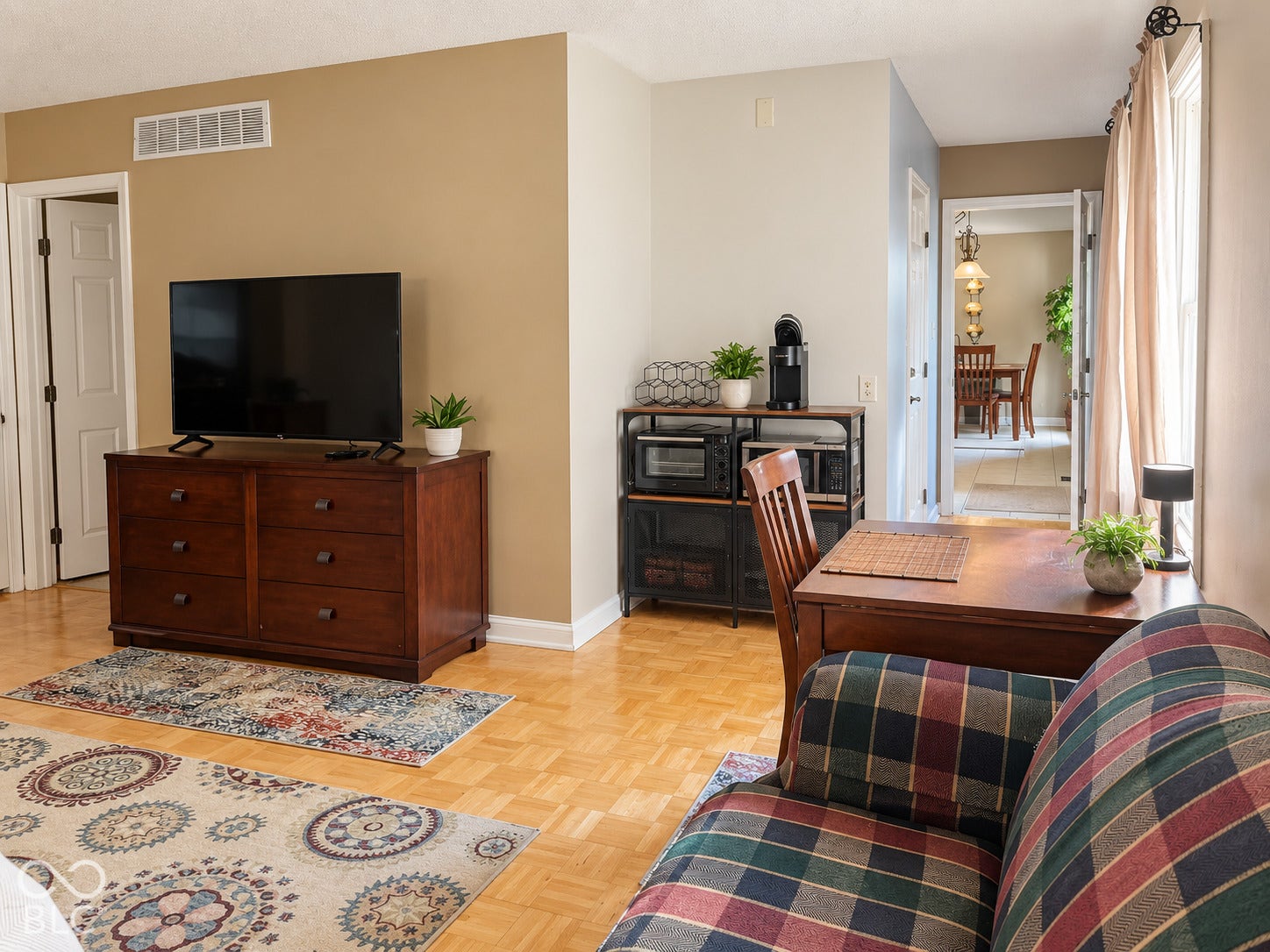 Wood-finish flooring throughout the main living area