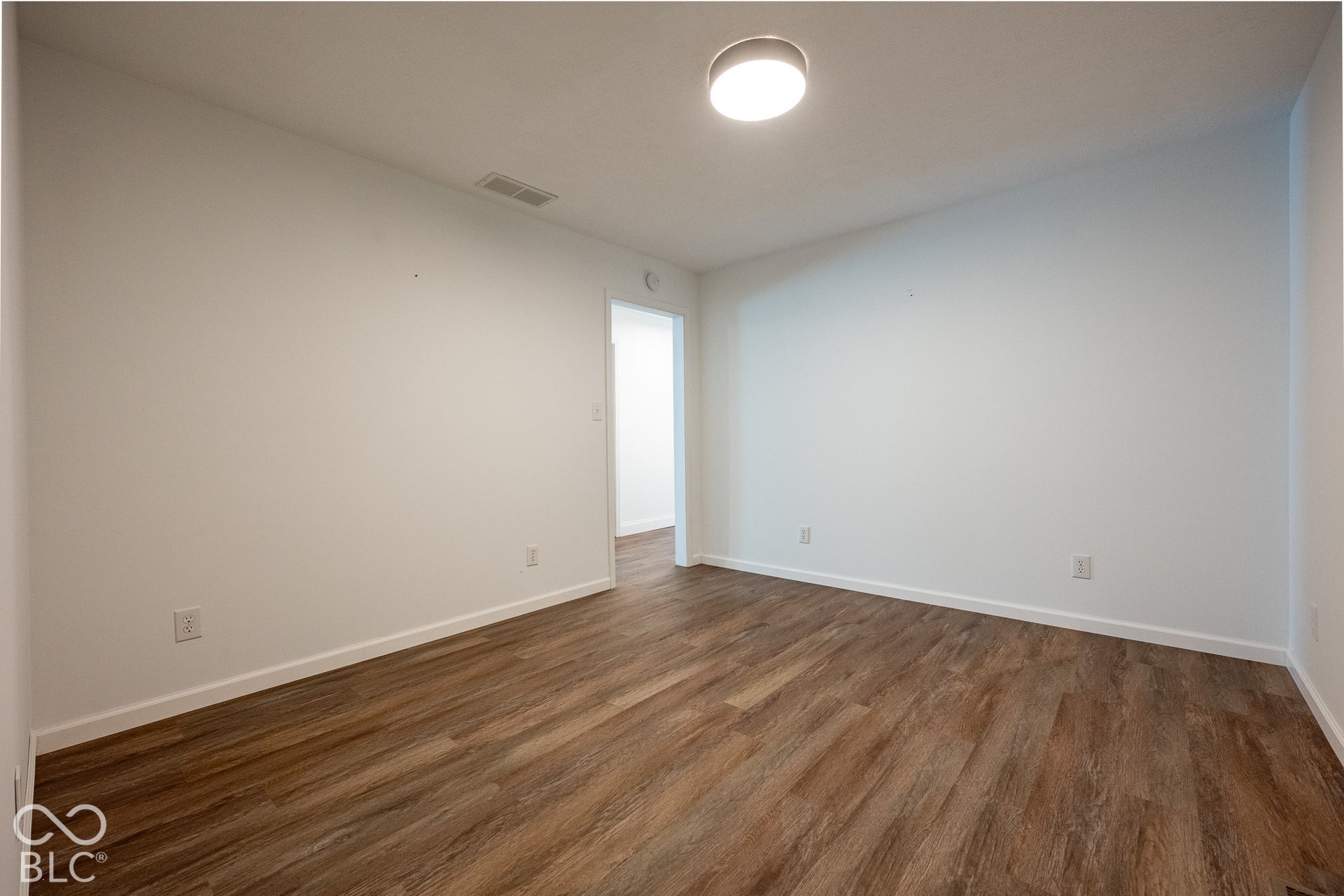 bonus room or office in the in-law suite. The access to the main part of the home is through here.