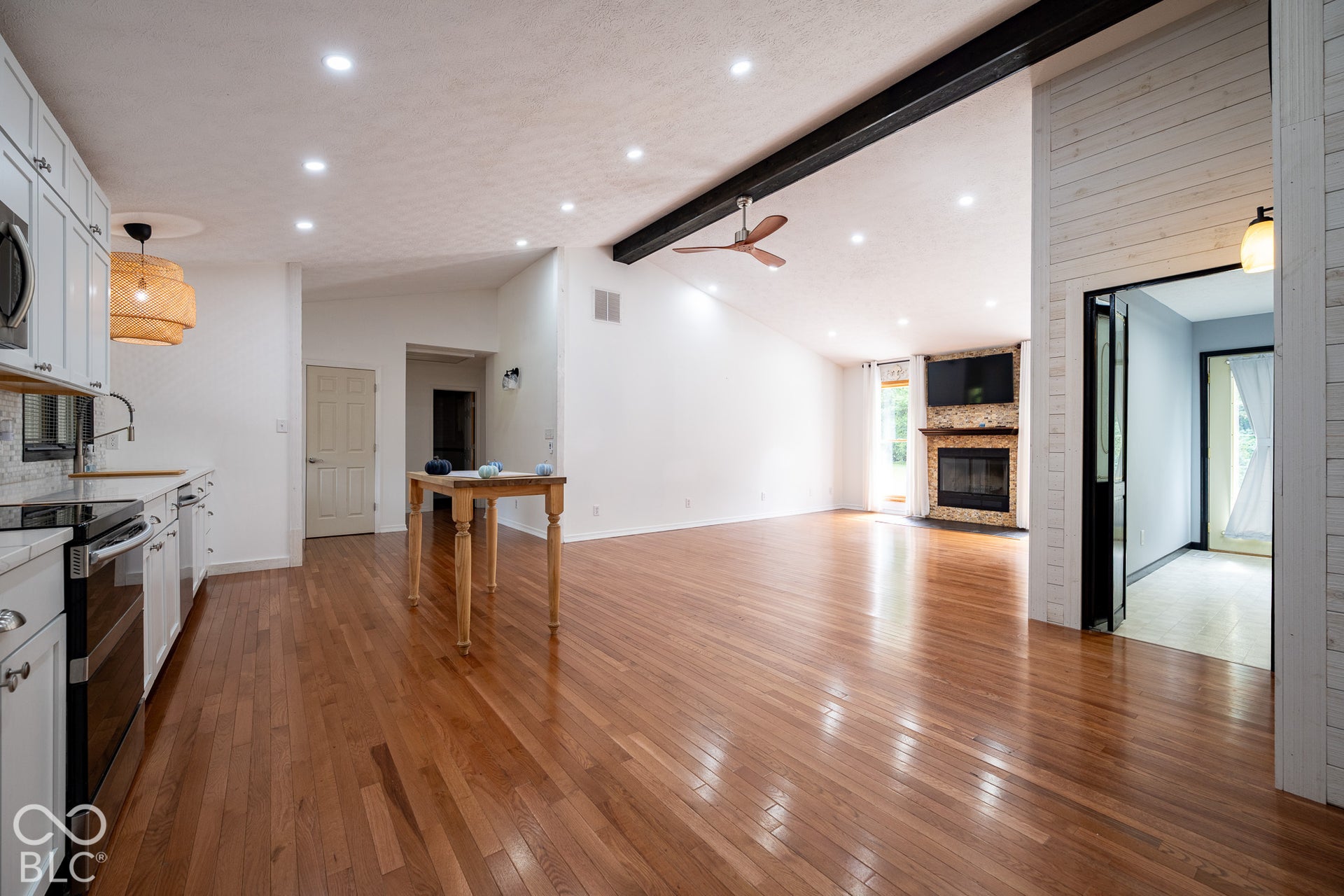 Beautiful high ceilings in open concept living area.