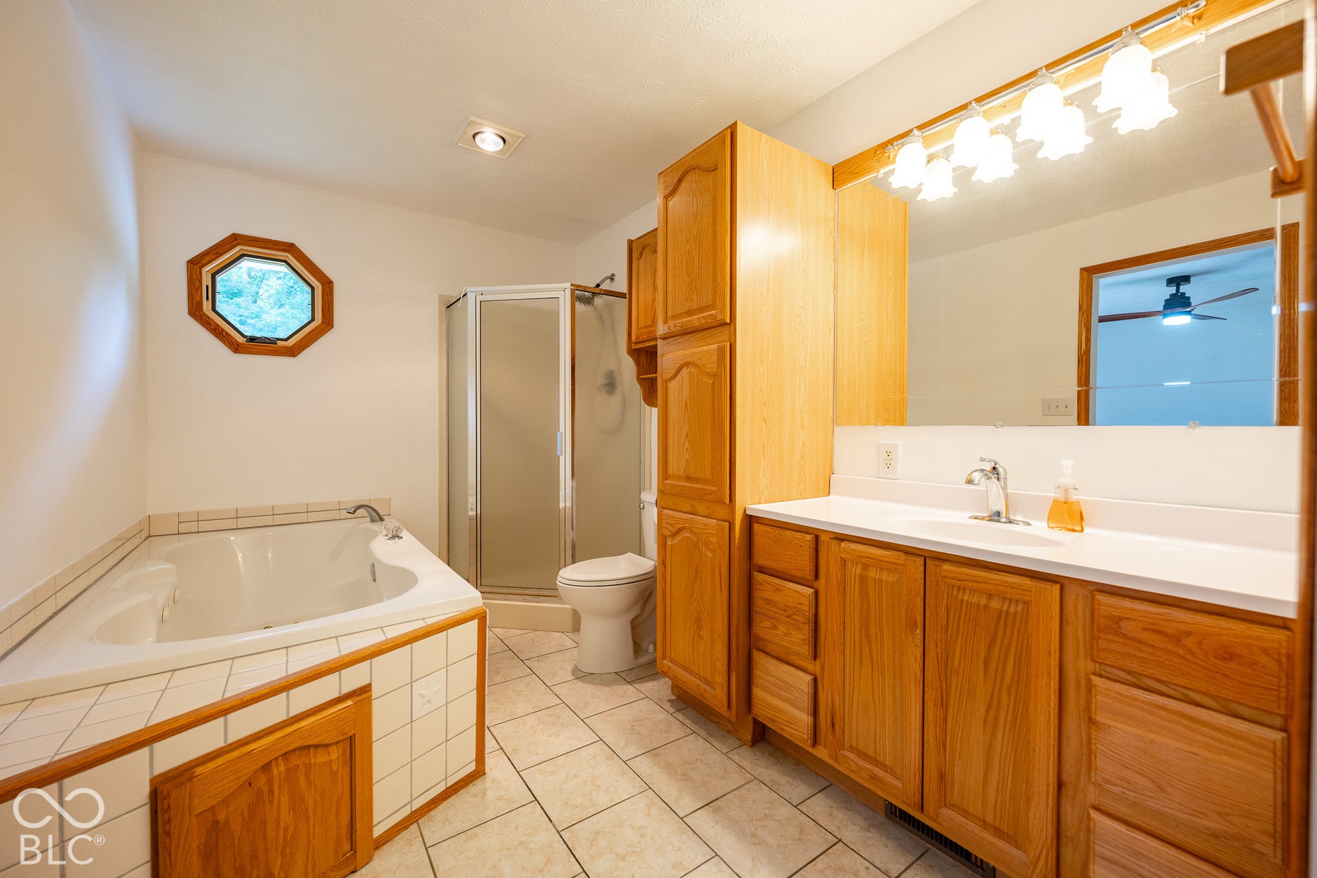 Primary bedroom has a private bathroom double vanity, shower and jetted tub.