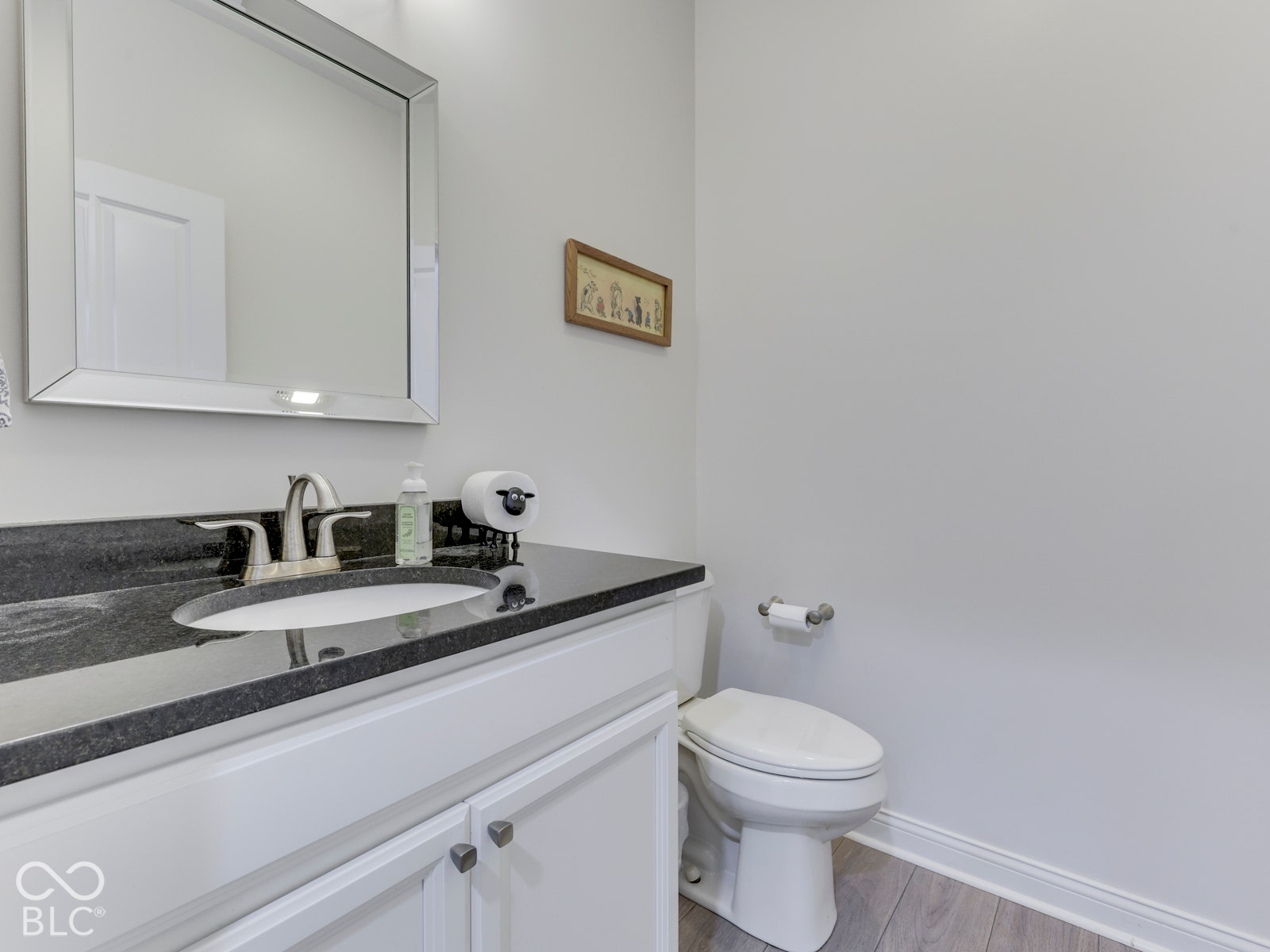 Half bath inside garage entrance