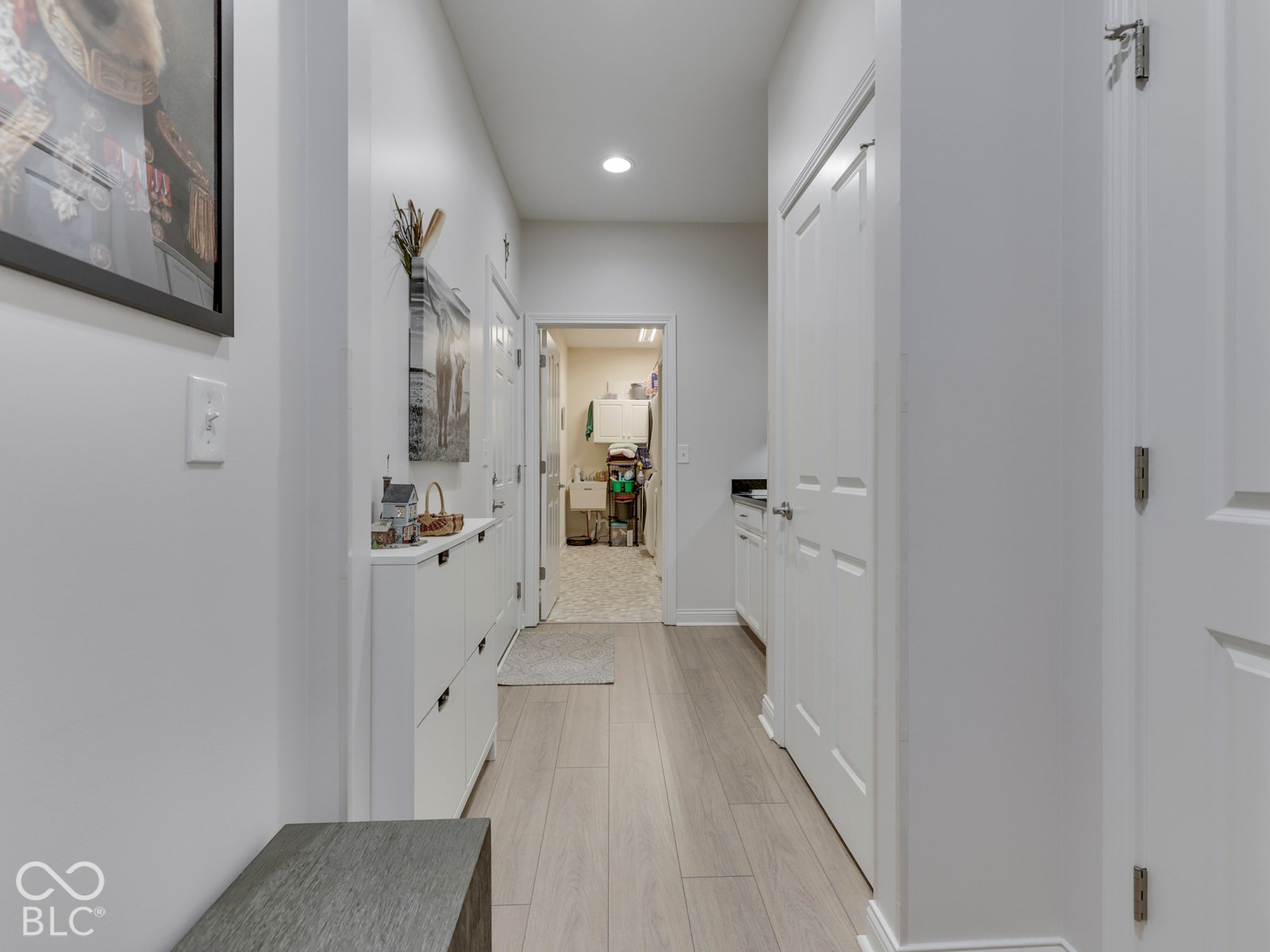 Hallway to the garage, laundry, closet storage &amp; drop zone