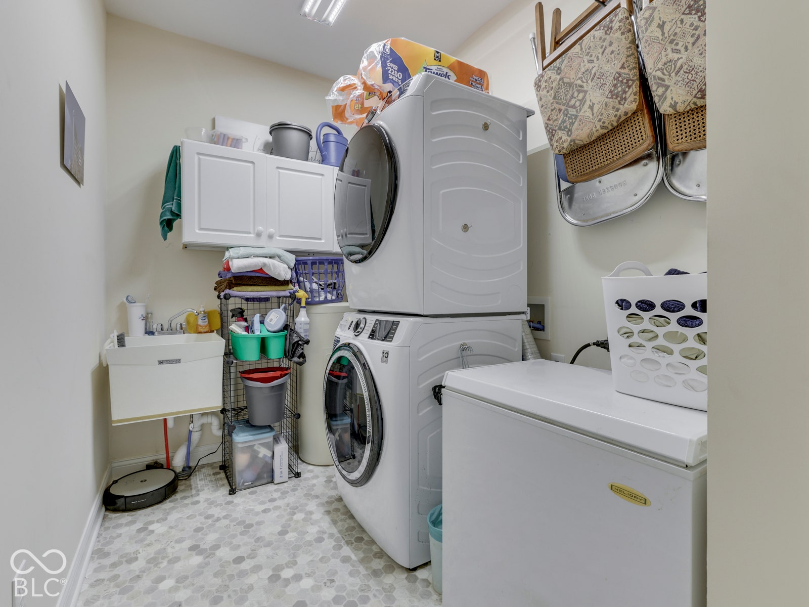 Laundry includes stackable washer/dryer, water softener (freezer excluded)