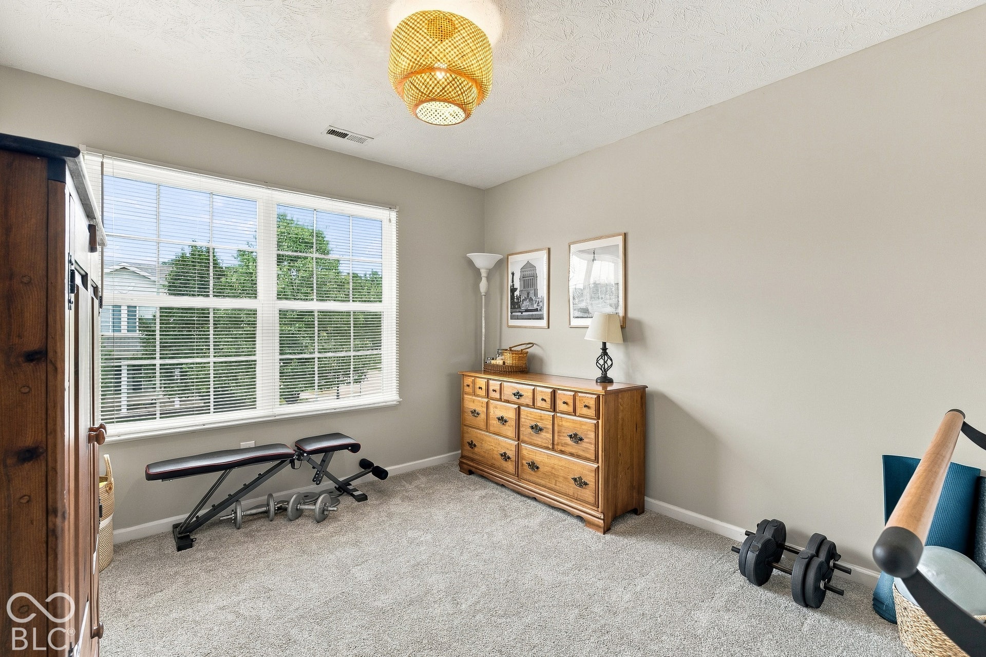 Third bed works well as a workout room or additional office
