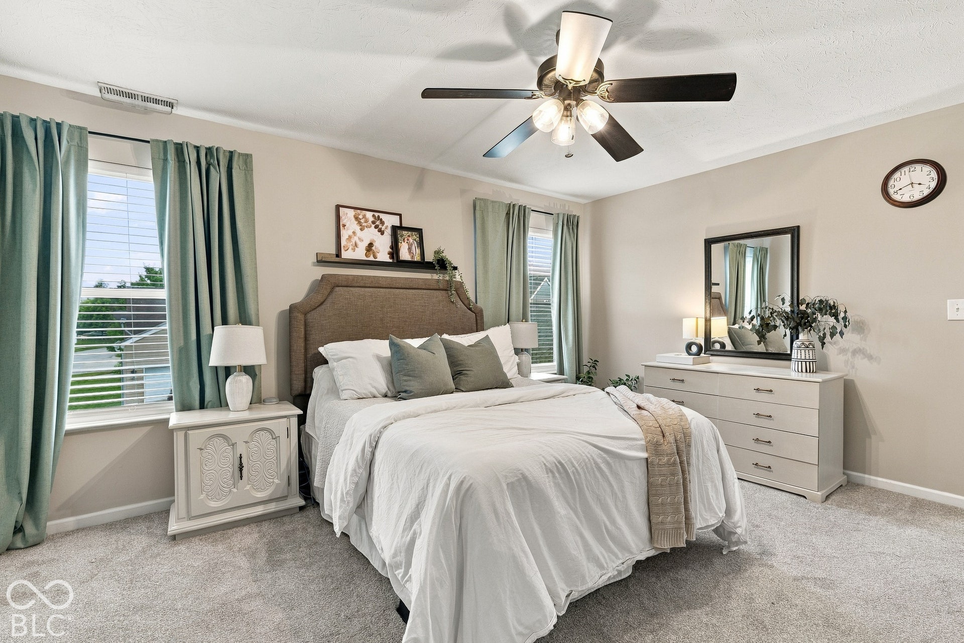Ceiling fan and flanking windows