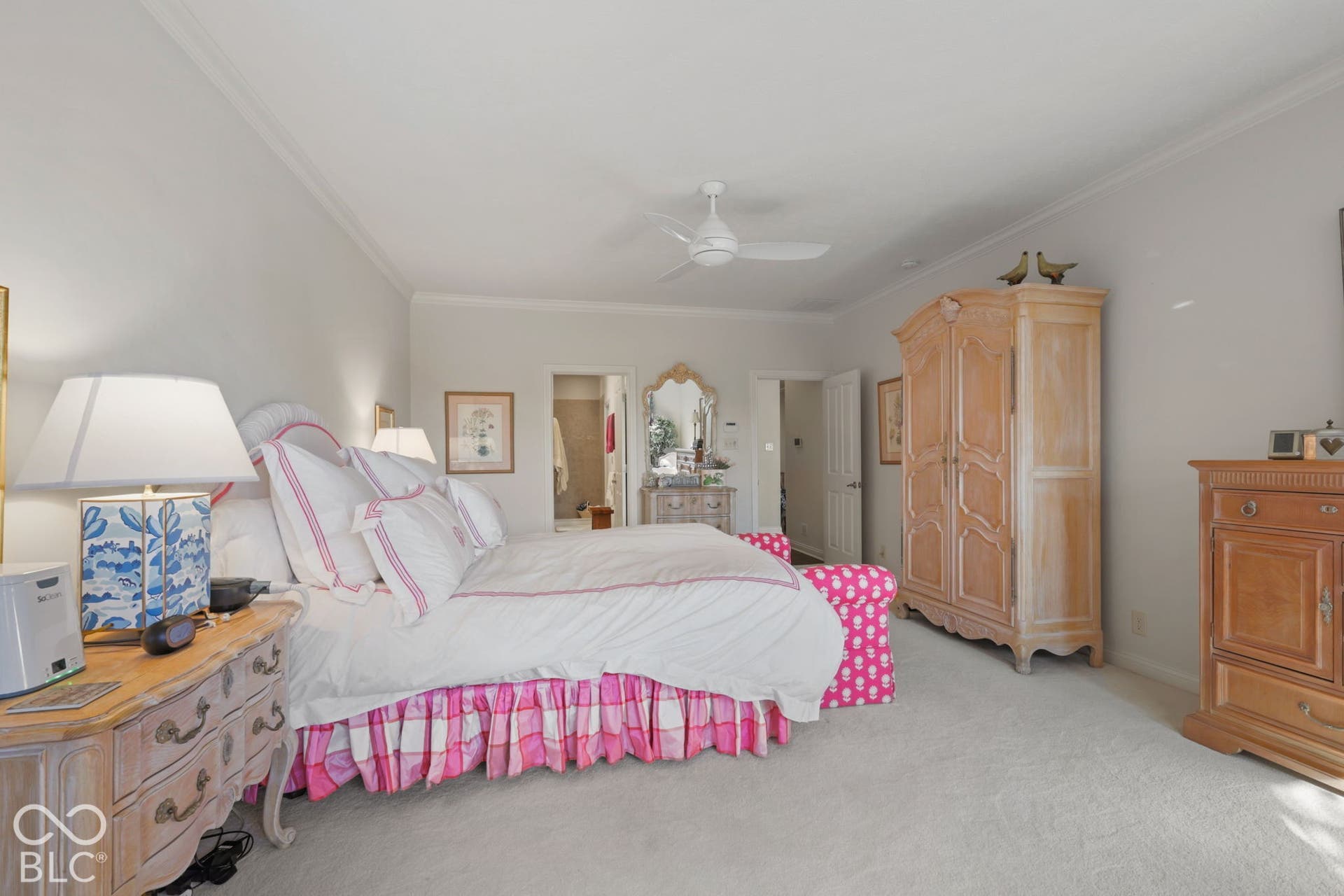 Wall-to-wall carpeting and crown molding