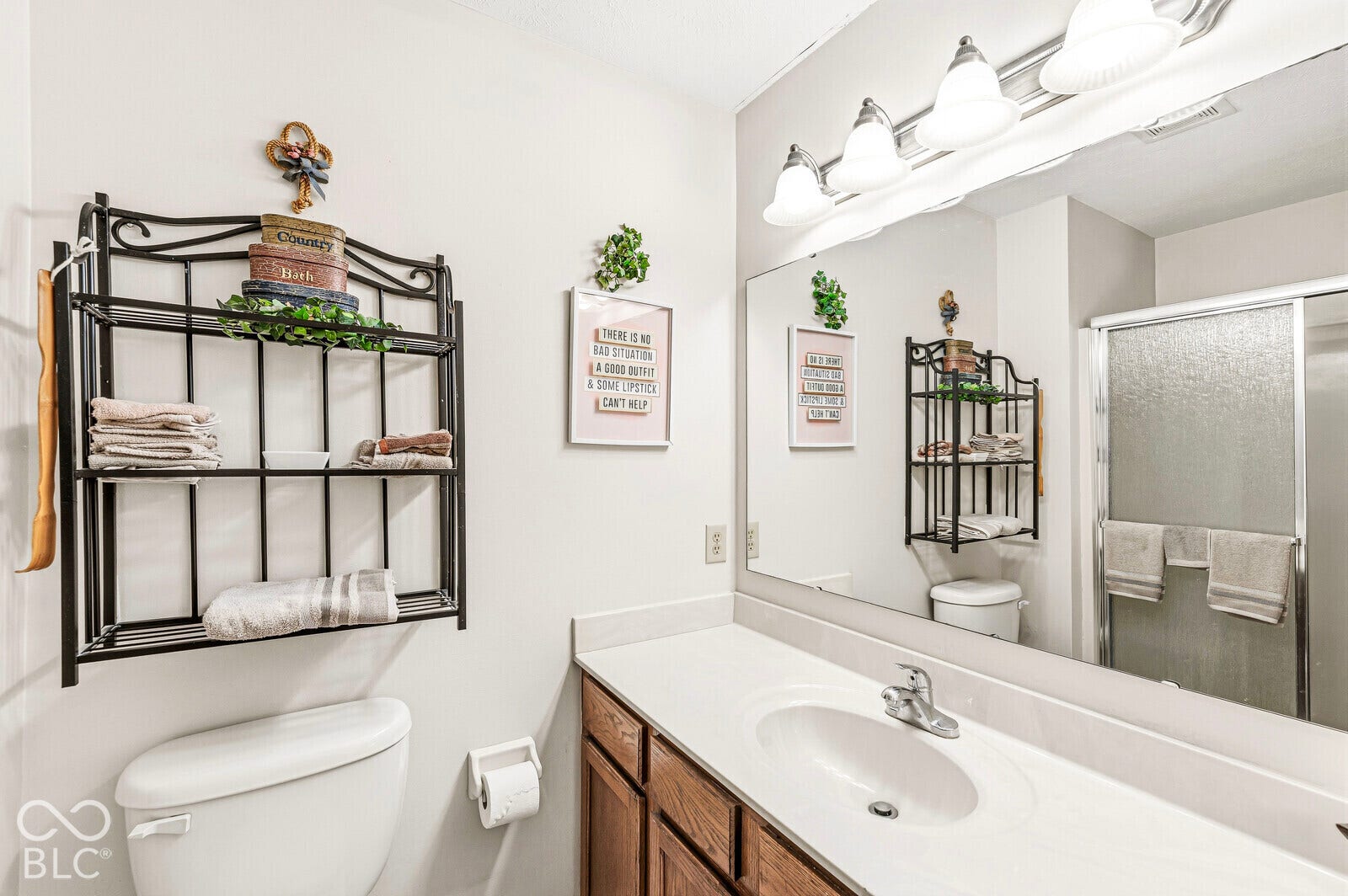 Primary bathroom - spacious vanity, walk-in shower with seat and shower doors