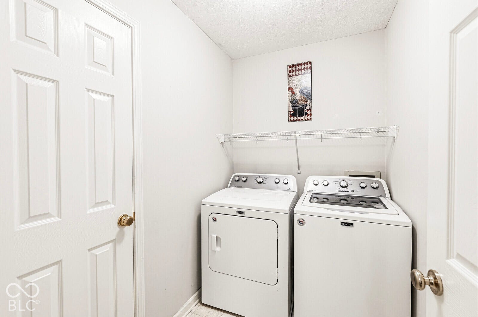 Laundry room approximately 5 x 7, washer and dryer included. Storage closet to the left in the picture.