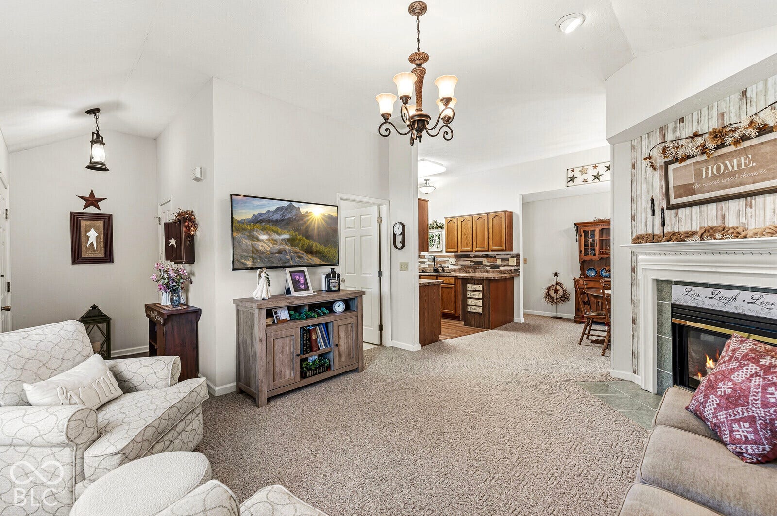 Living room - open-concept layout to the kitchen and dining space.