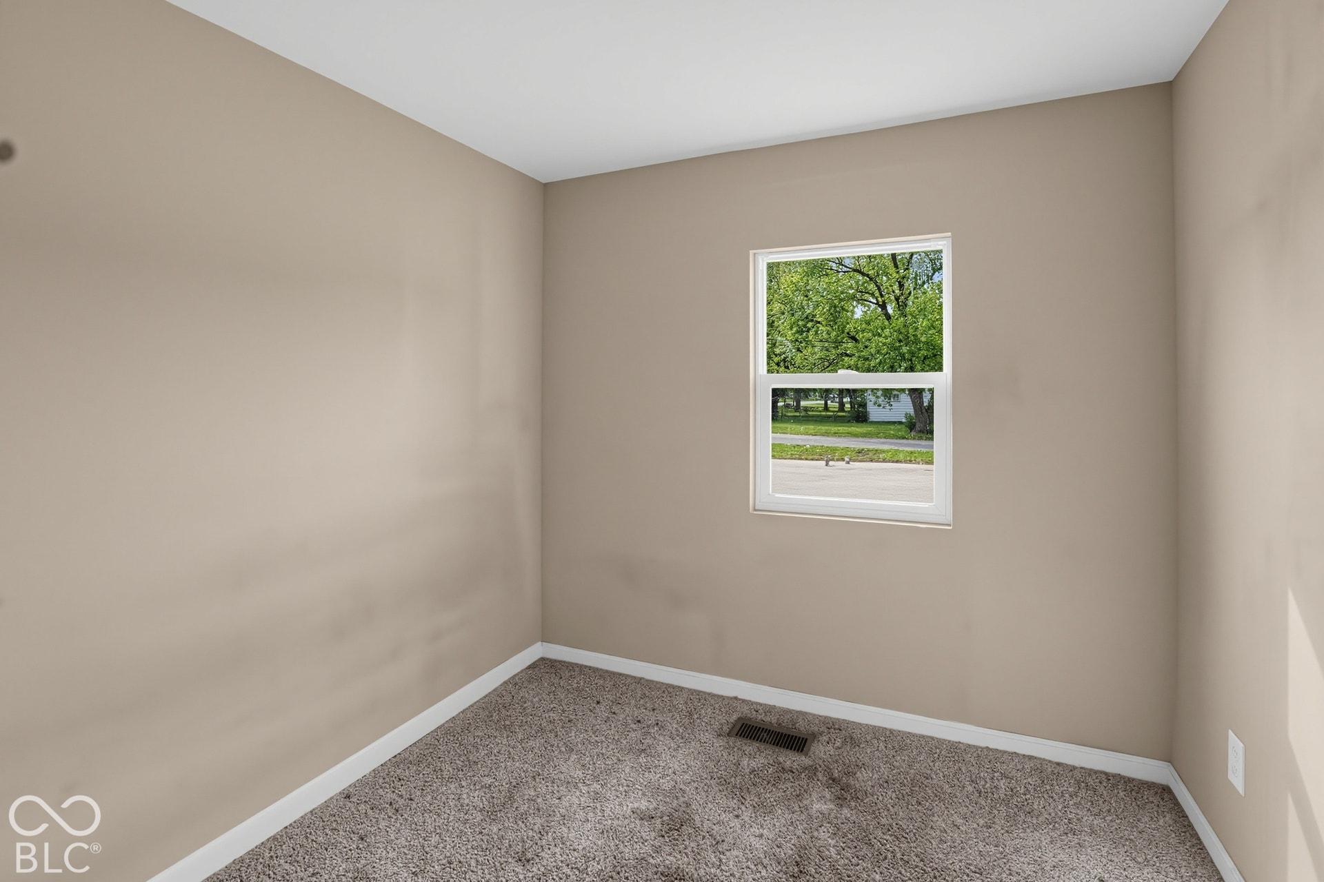 3128 S Rural Street, Indianapolis, IN 46237 Neutral-toned walls complement the clean white trim