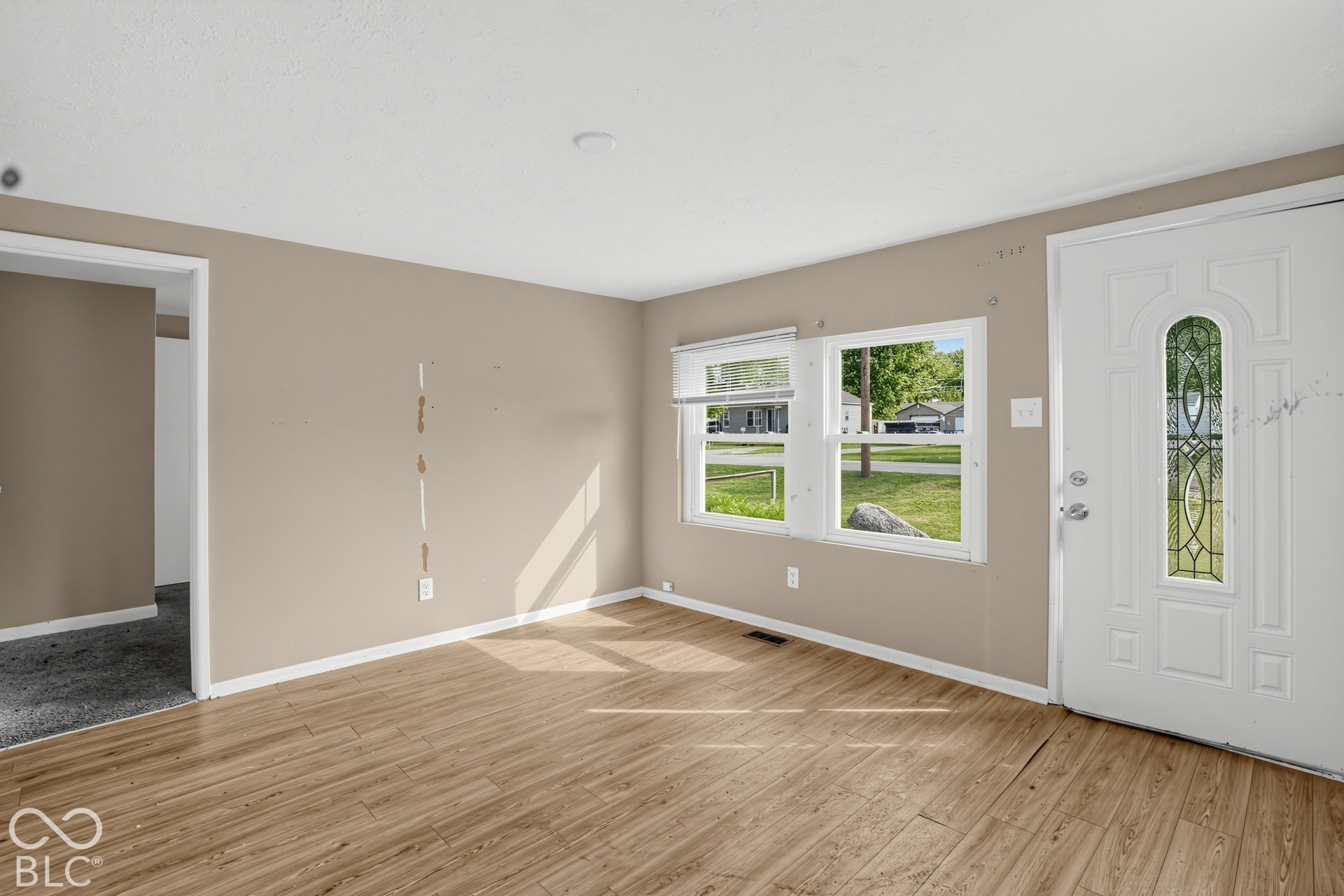 3128 S Rural Street, Indianapolis, IN 46237 Wood-finish flooring with neutral wall tones