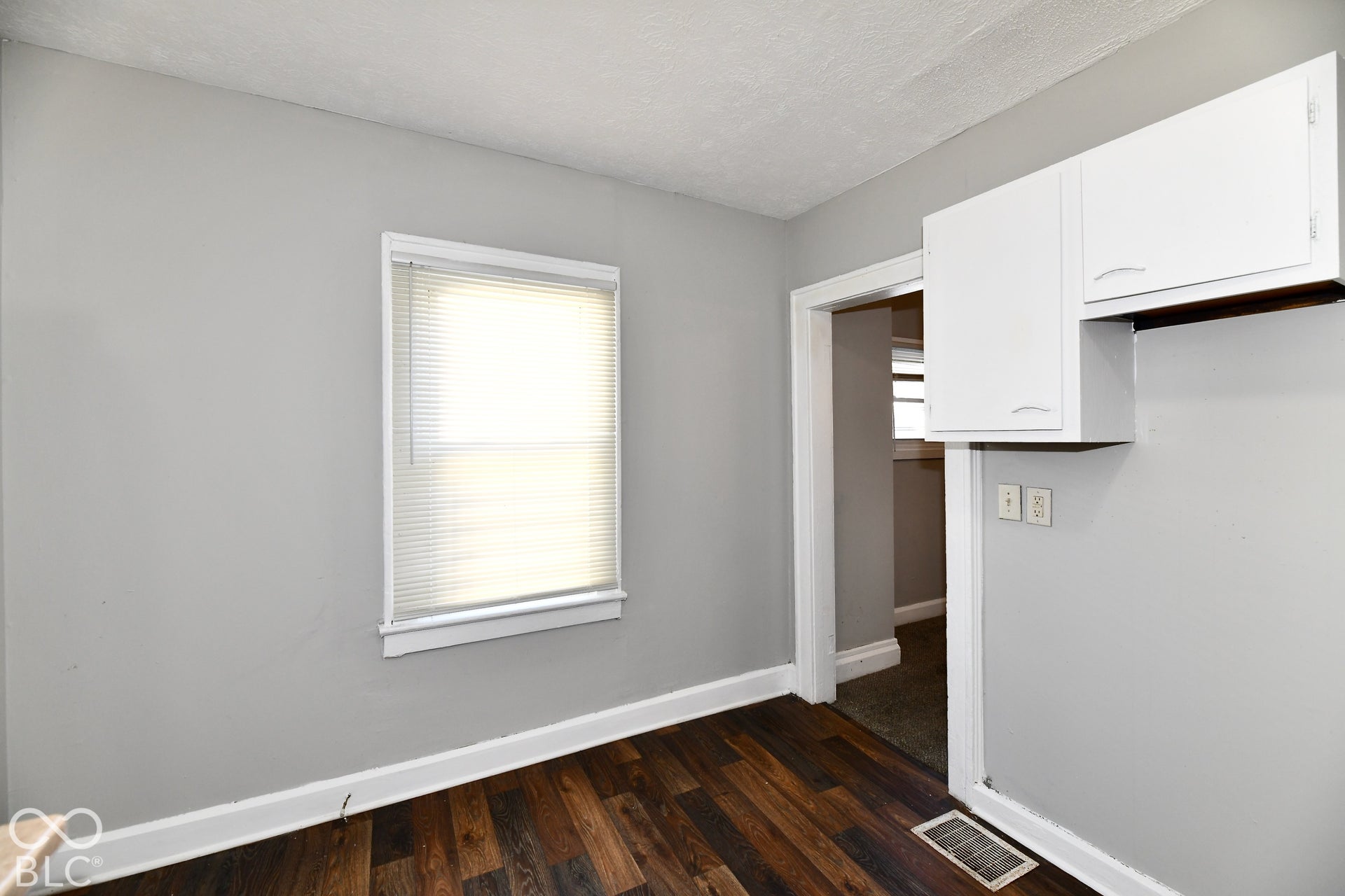 Wood-finish flooring with white trim