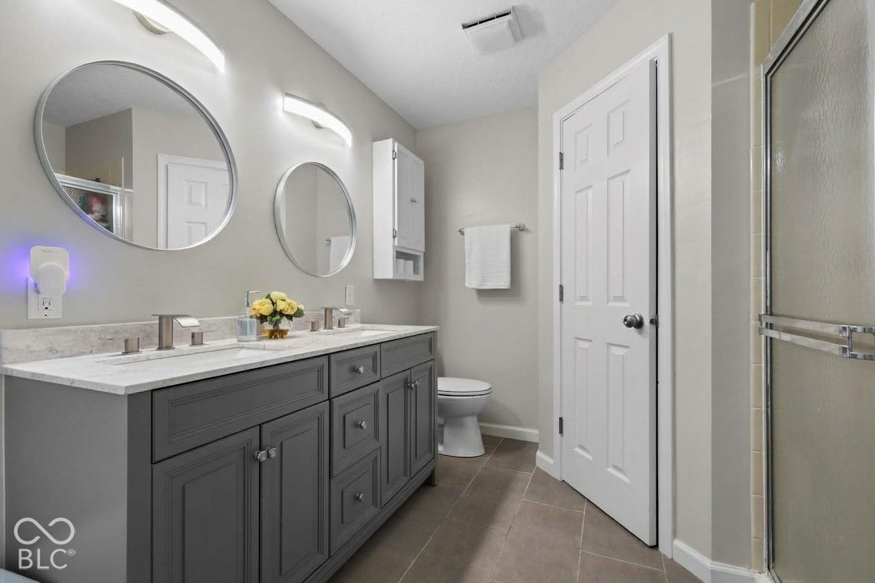 Virtually Altered - Photo virtually altered to show neutral paint in master bathroom.
