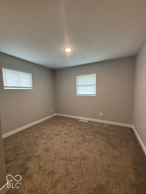 252 Indiana Street, Plainfield, IN 46168 Recessed ceiling lighting, two windows with blinds, light gray wall paint