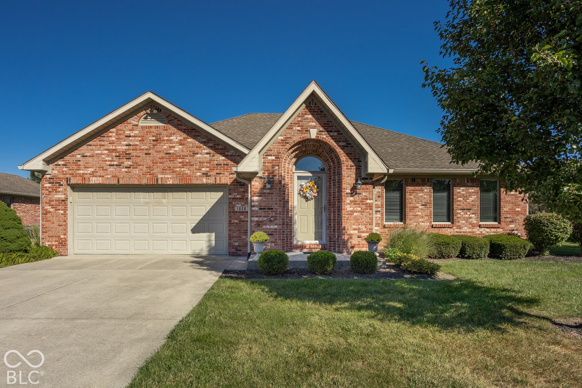 Welcome home to 1026 Plum Street in Brownsburg's low-maintenance Holiday Pines community!