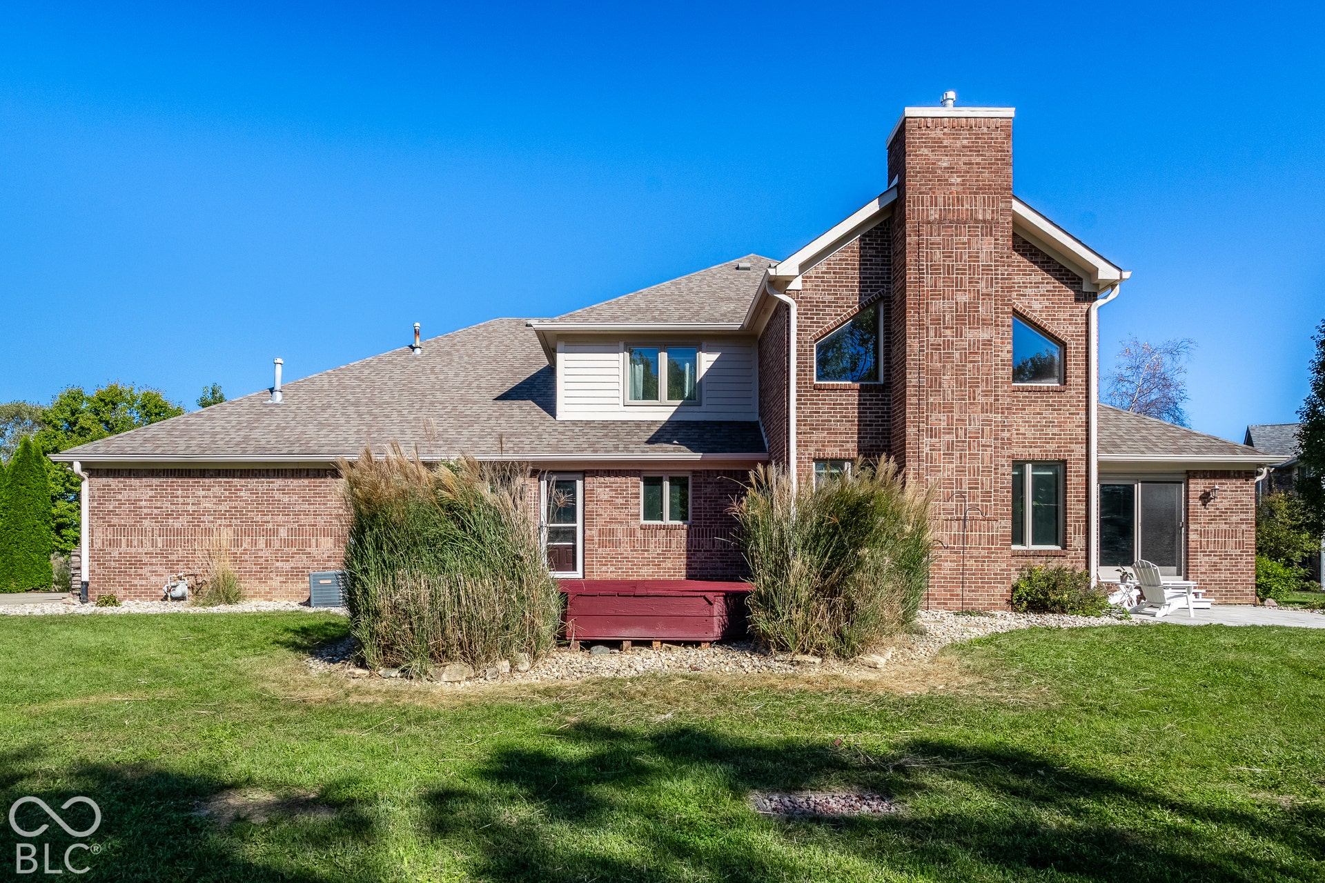 Brick exterior, deck, paver patio