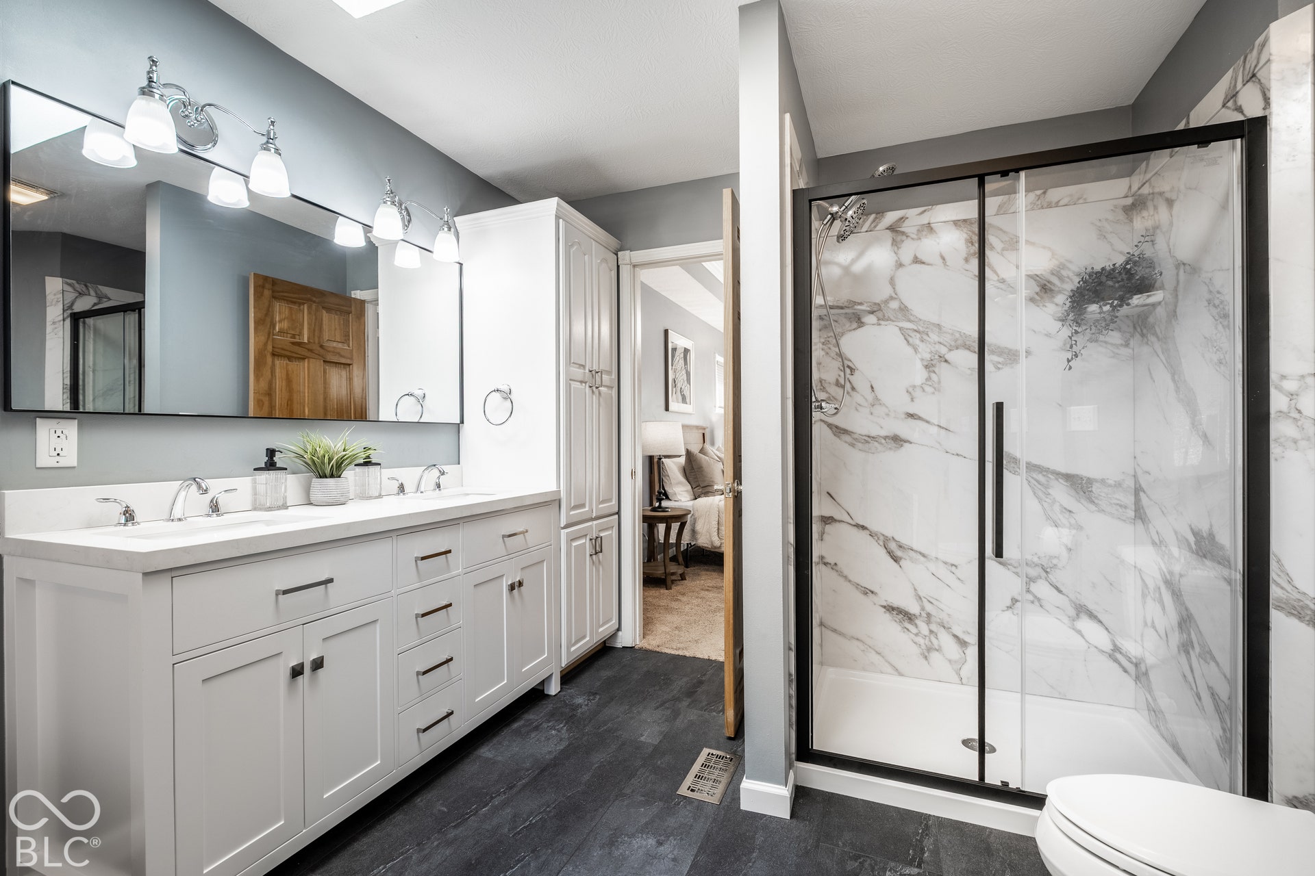 Renovated primary suite bathroom, view of walk-in shower
