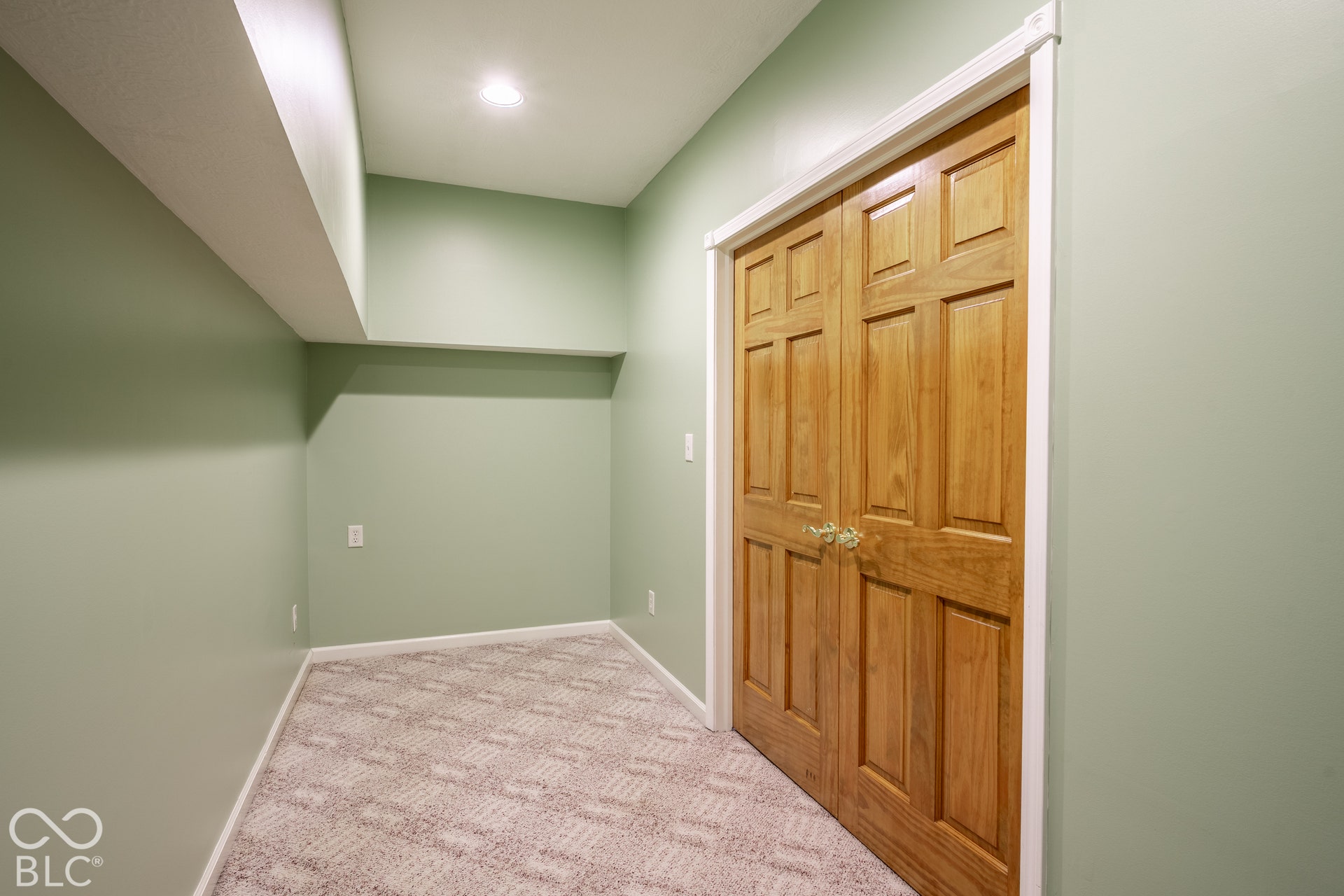 Basement storage room off of billiard area