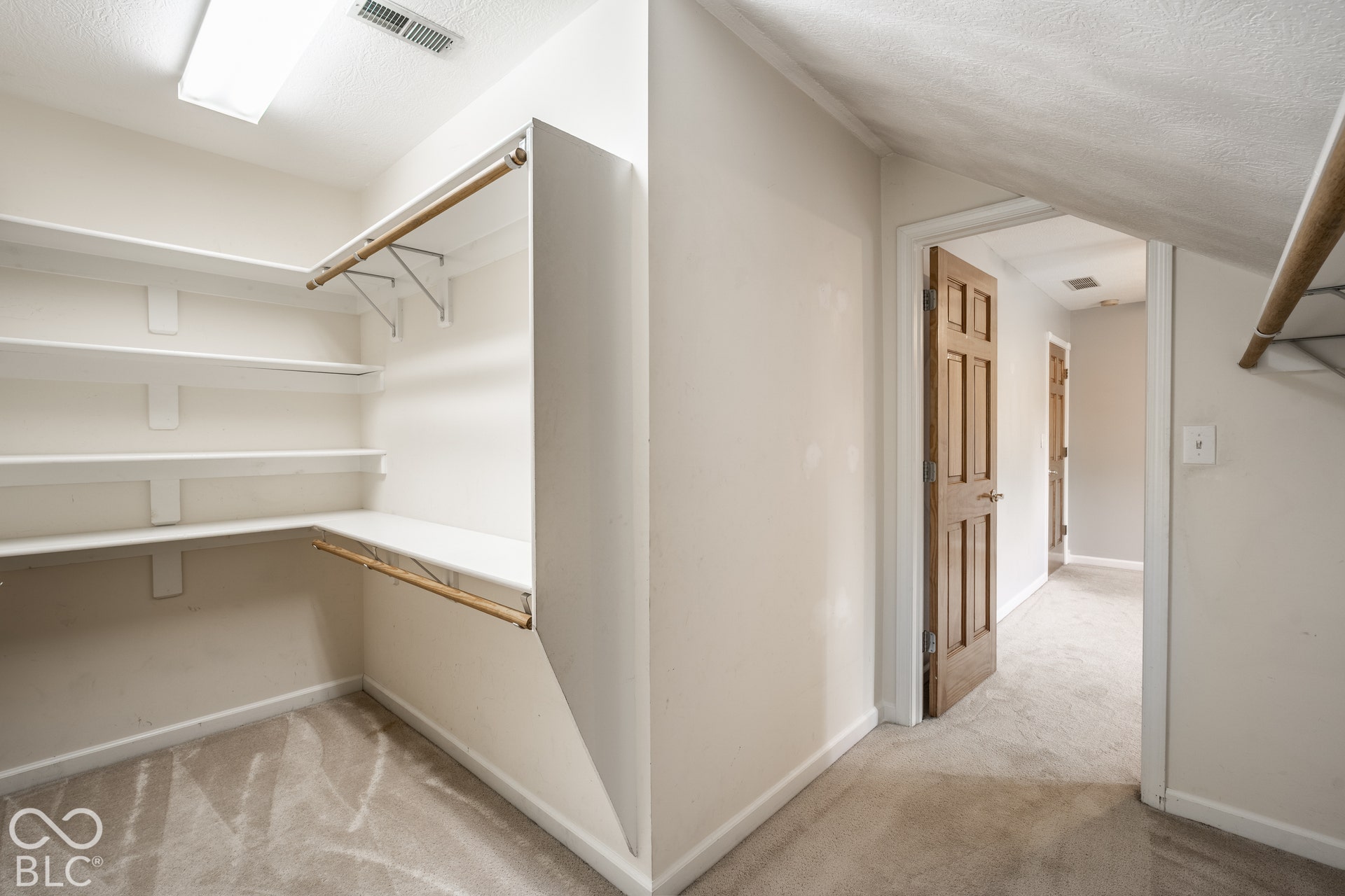 Bedroom 2 Walk-in closet with built-in shelving