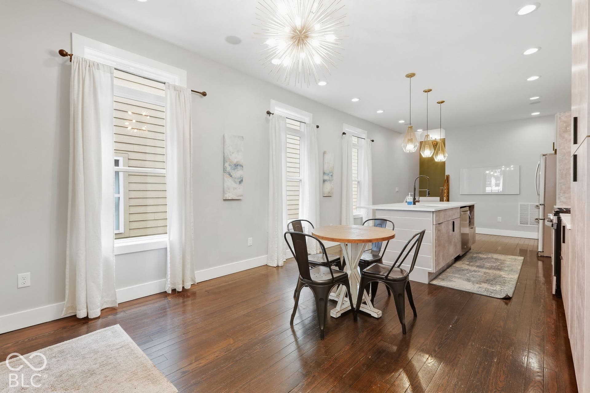Dark wood-finish flooring throughout