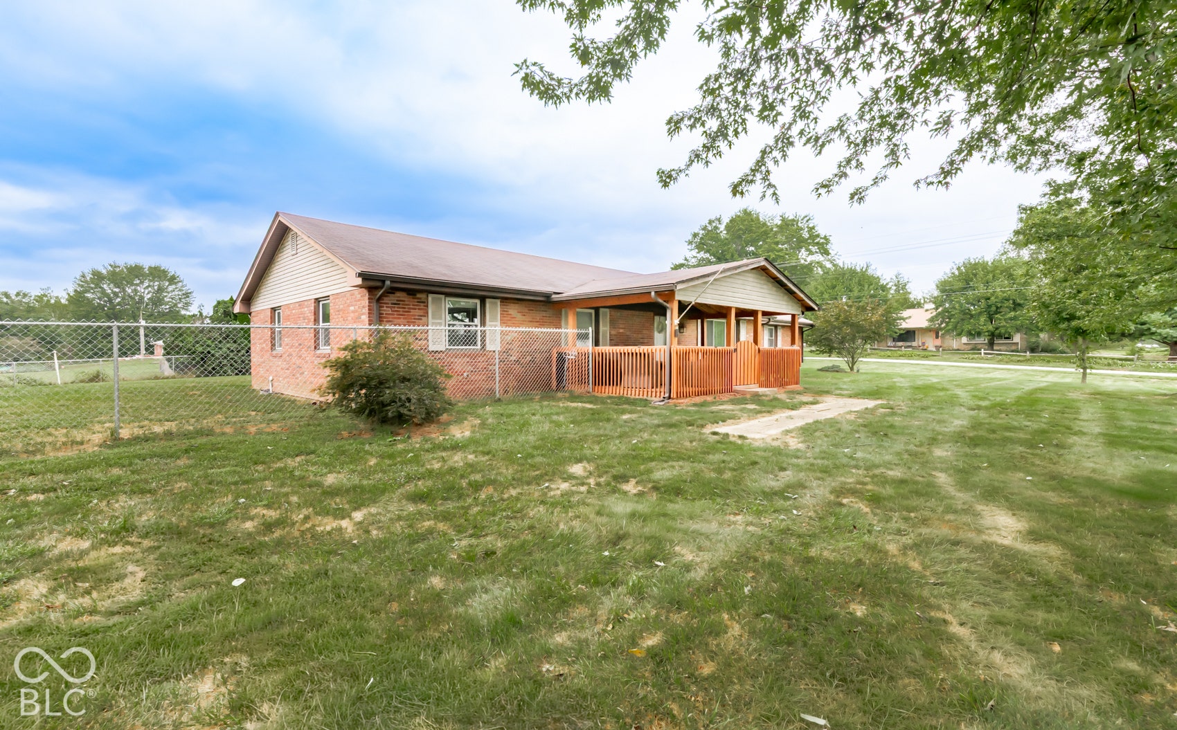 Brick exterior with horizontal siding accents