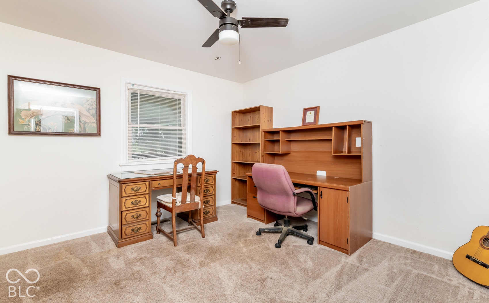 Carpeted flooring, ceiling fan, and window with blinds