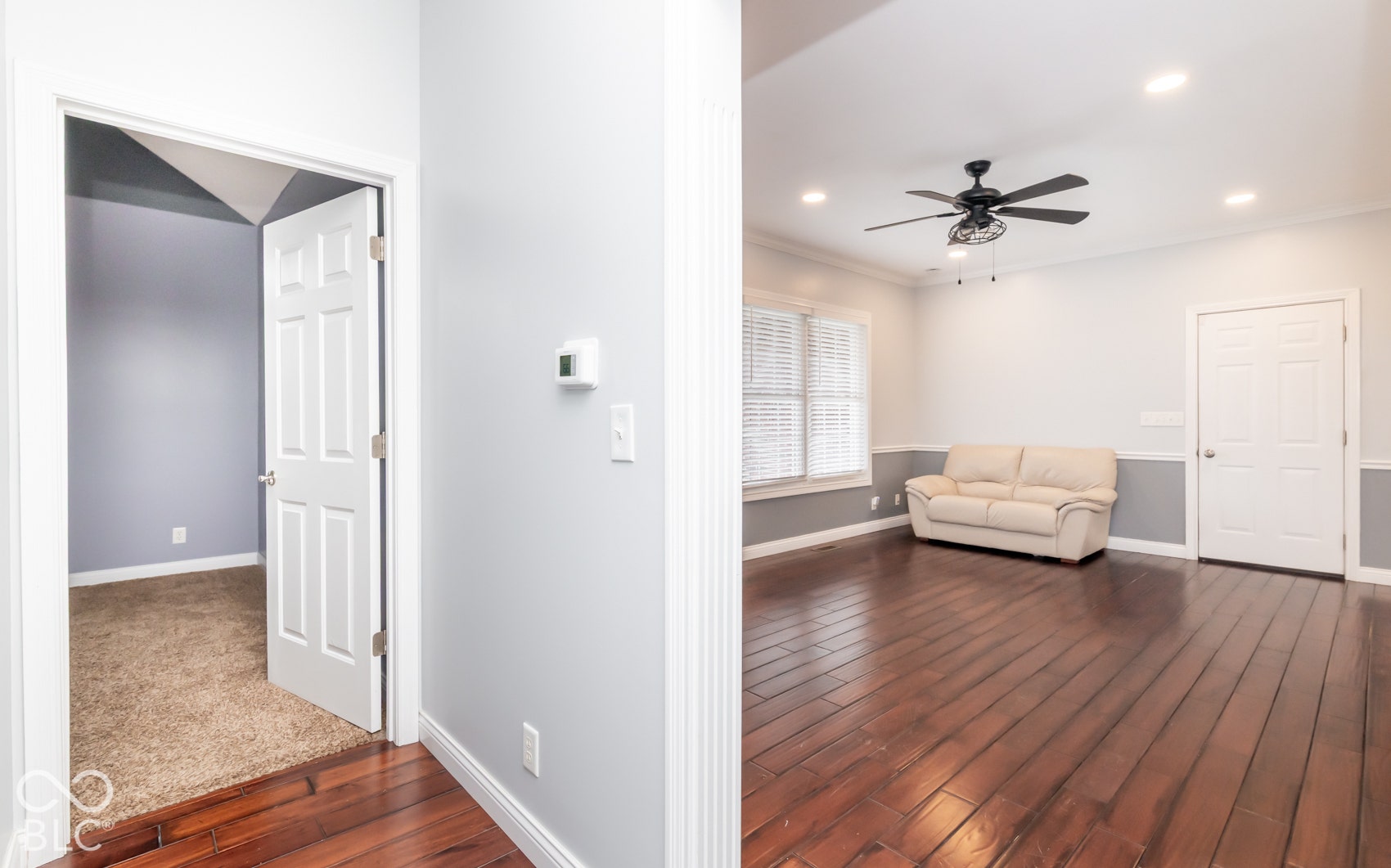 Wood-finish flooring throughout the main area