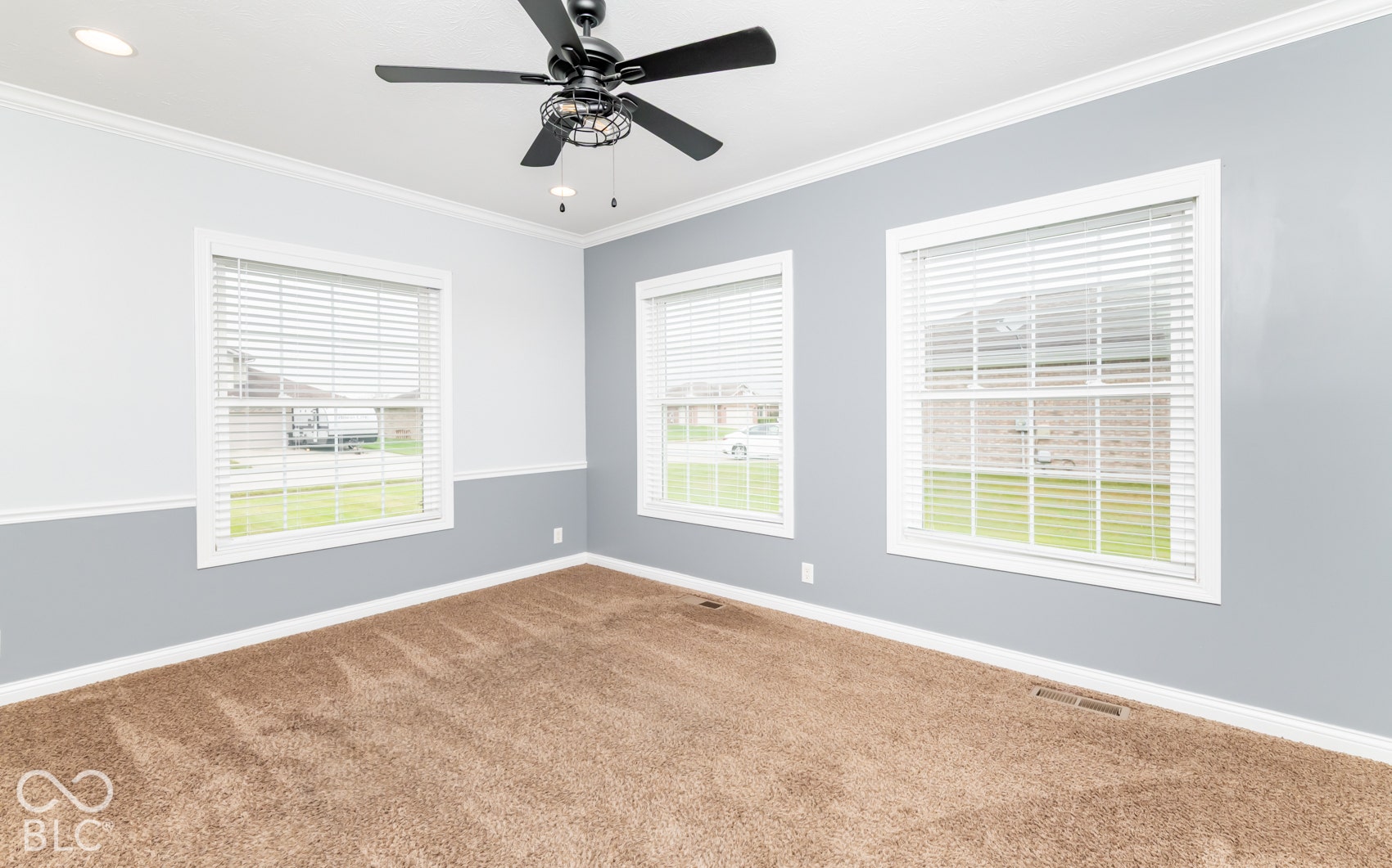 Recessed lighting, crown molding, and a ceiling fan with light fixture