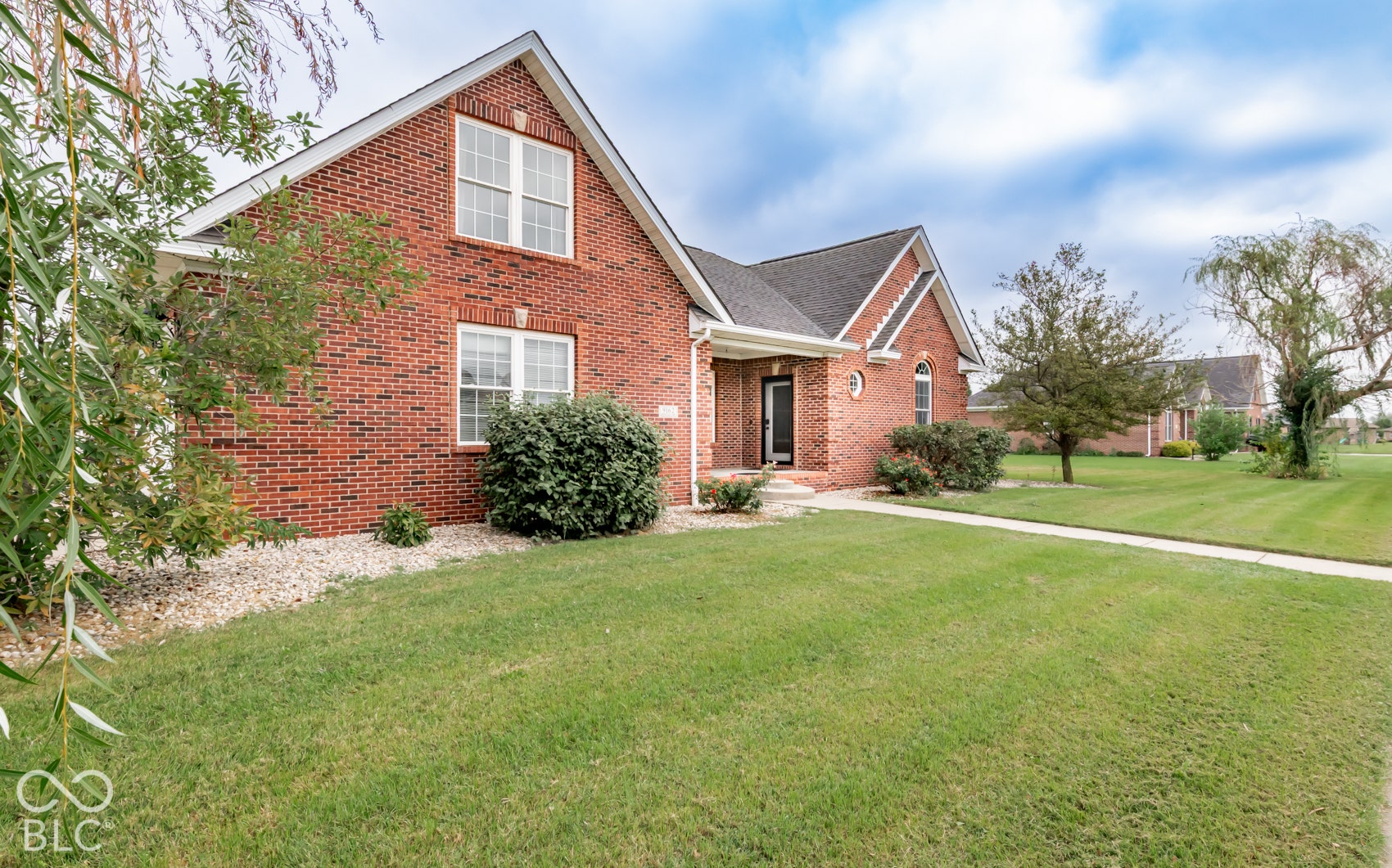 Brick exterior with white window trim