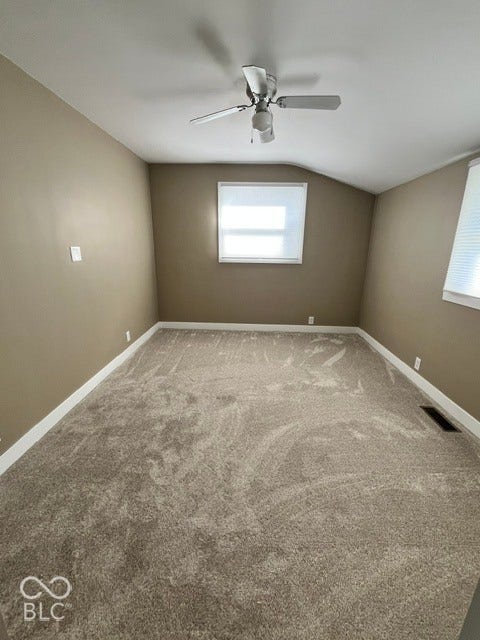 415 W Main, Greensburg, IN 47240 Bedroom 2 with Plush carpeting, white trim, and a ceiling fan with light fixture